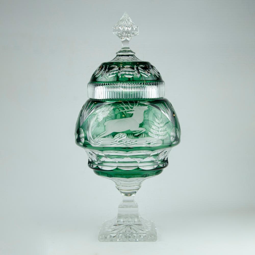 Bohemian Czech candy box covered in green double tail glass
This decorative Overlay glass lidded bowl, 20th century is in beautiful conditions! 
Very attractive at first glance, and can be used as the centerpiece of any table or hall at home as a