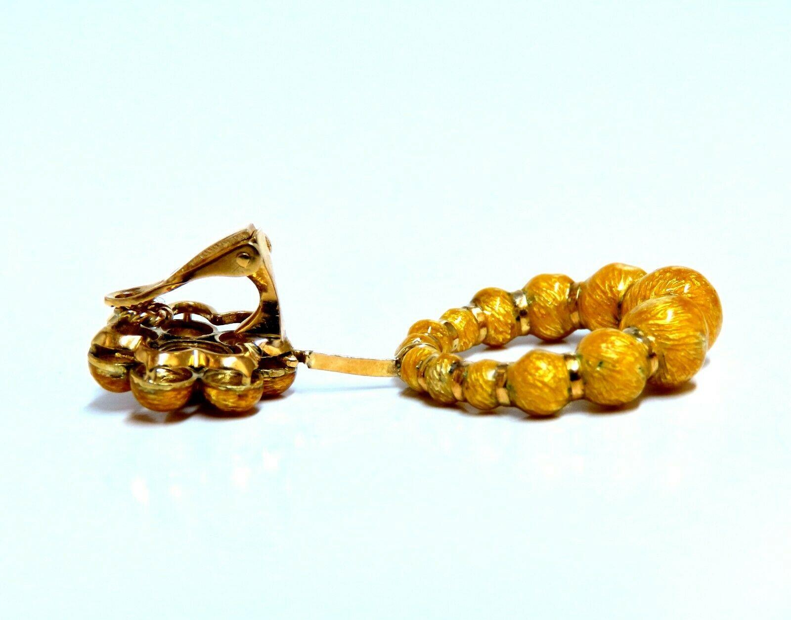 Yellow Enamel Cluster Large Bead Dangle earrings

Measurements of Earrings:

15.8mm diameter cluster (Upper)

24mm Diameter (Larger Circle)

1.85 inch long

28.7 grams / 18kt. yellow gold

Postless clips

Earrings are gorgeous made