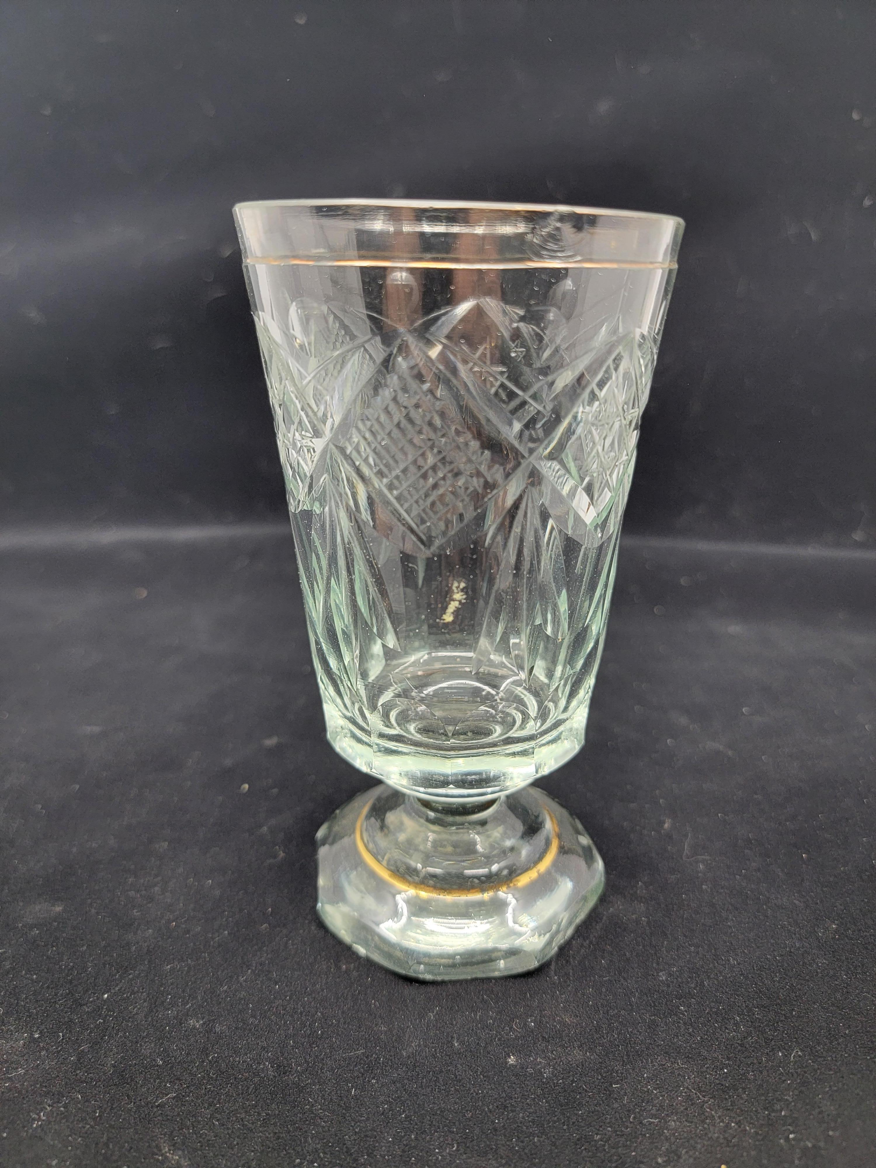 This Czech Bohemian glass is a wonderfully strong and delicate piece at the same time. When it is in your hand you know you can really grasp this goblet. The etch is deep and decisive and the silhouette is bold and commanding. The gold rim is faint