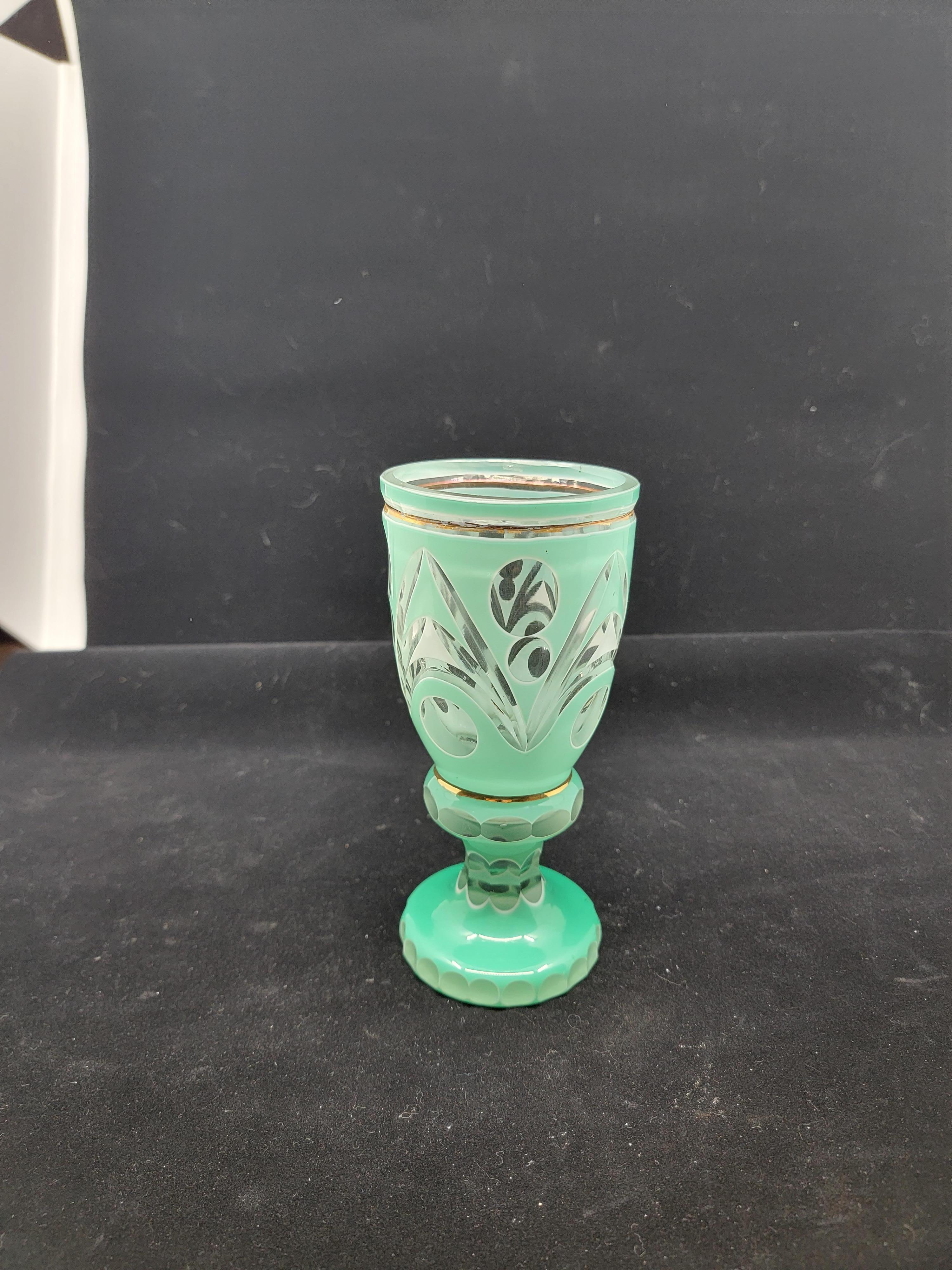 This pattern is similar to the pattern of the ruby bohemian goblet offered on our site. The coloring is rare. This pale green is striking and is a perfect compliment to the ruby offering also on our site. Look at them together. These will act as His