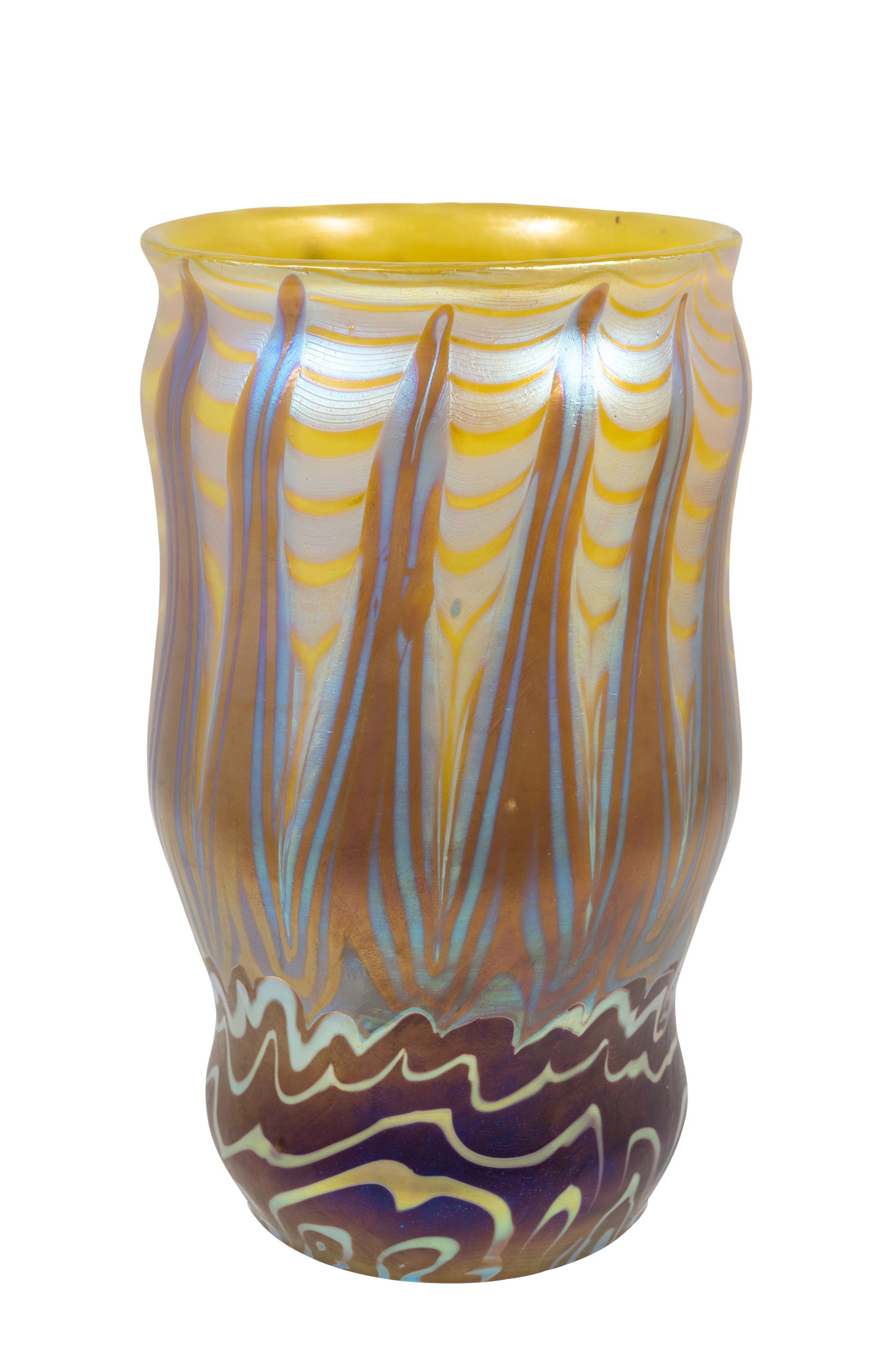 Bohemian glass vase, manufactured by Johann Loetz Witwe, PG 356 decoration, ca. 1900, Brown, Silver, Yellow, Blue, Viennese Art Nouveau, Jugendstil, Art Deco, art glass, iridescent glass.

Technique and material: Glass, mould-blown and freeform,