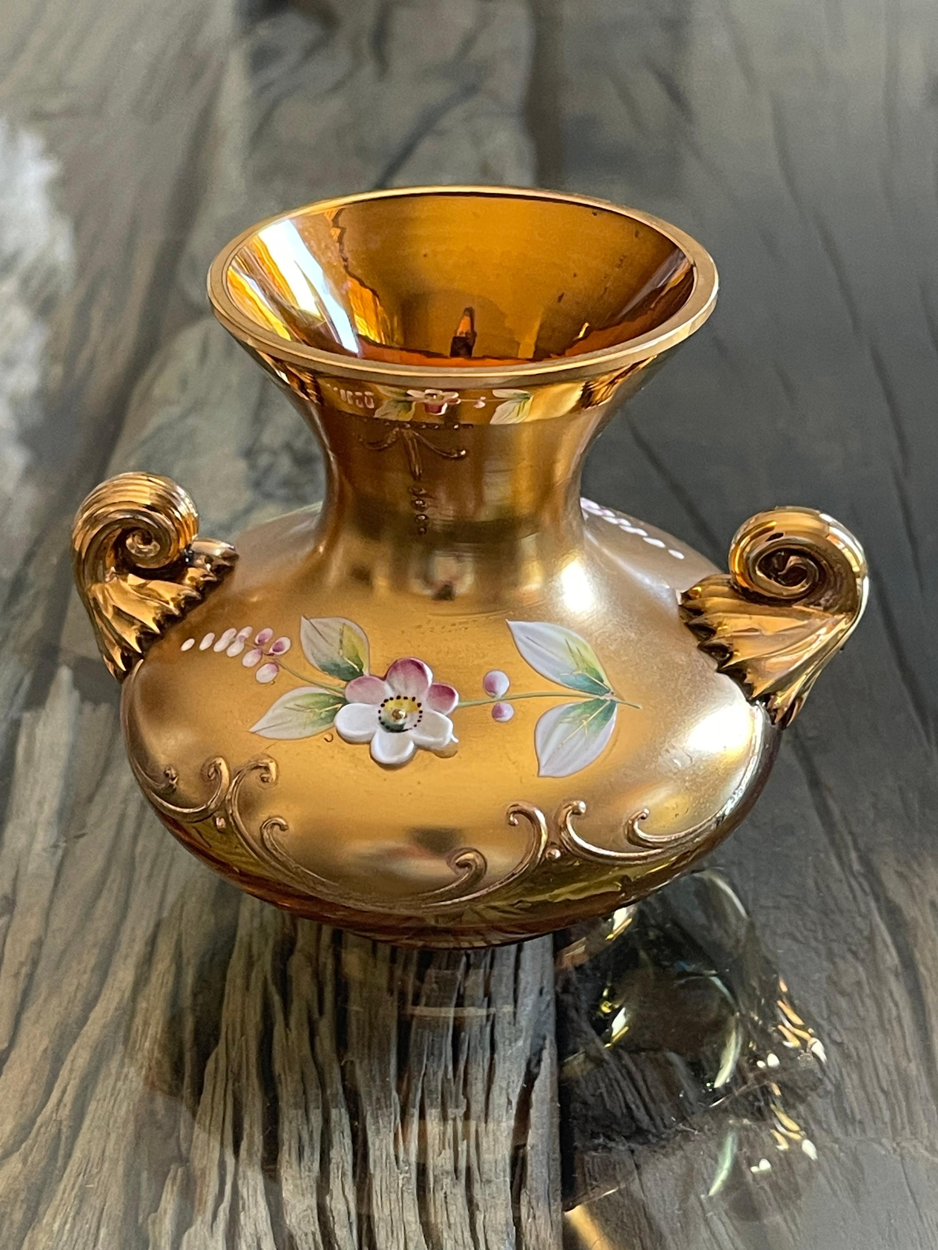 Lovely Bohemian blown glass gold with polychrome enamel glass vase. Decorated with Etruscan style handles. Great decor or precious gift.