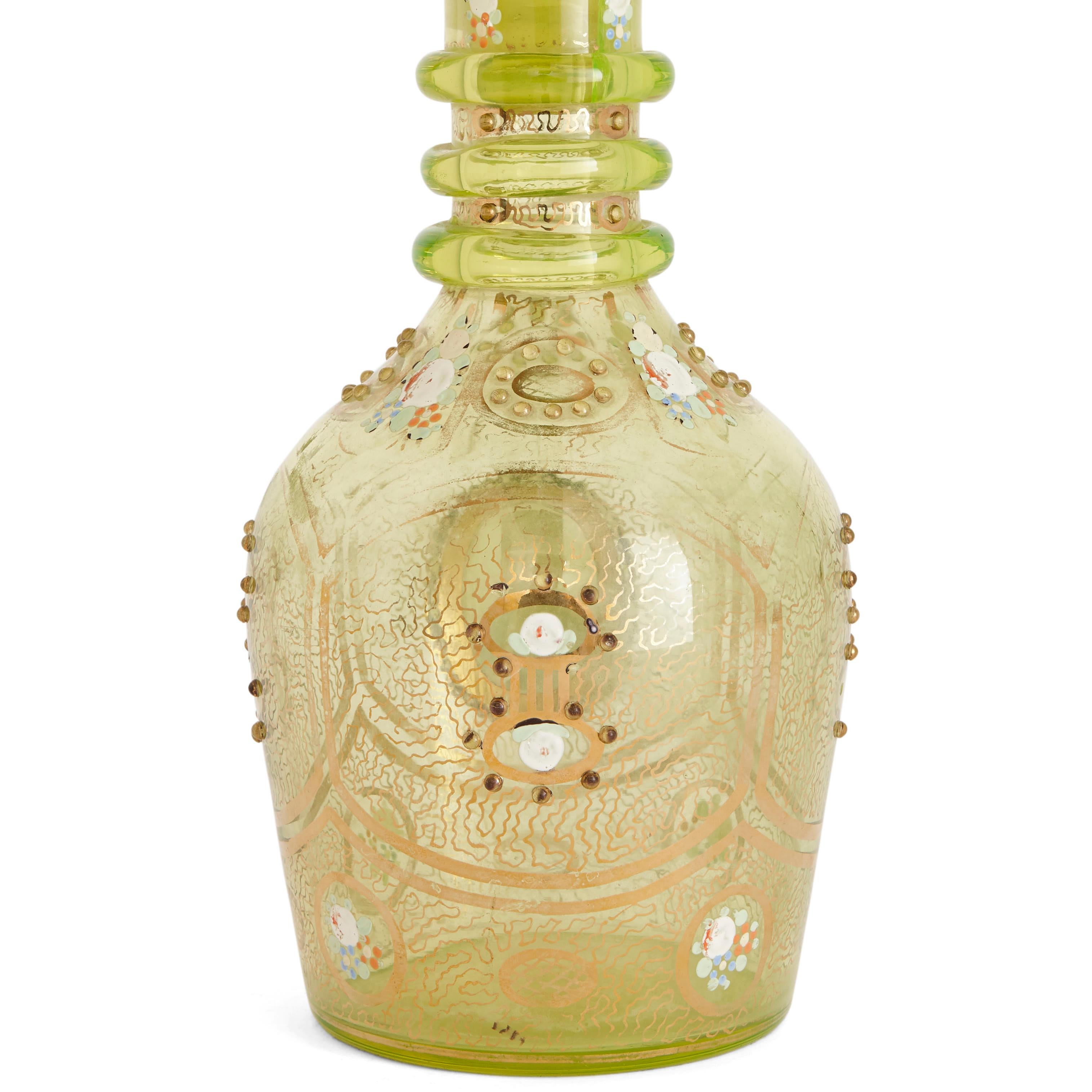 This wonderful lime green glass decanter was crafted in Bohemia, a historic region which now forms part of the Czech Republic, in the late 19th century. The piece was created for the Persian (modern-day Iranian) market.

The decanter features an