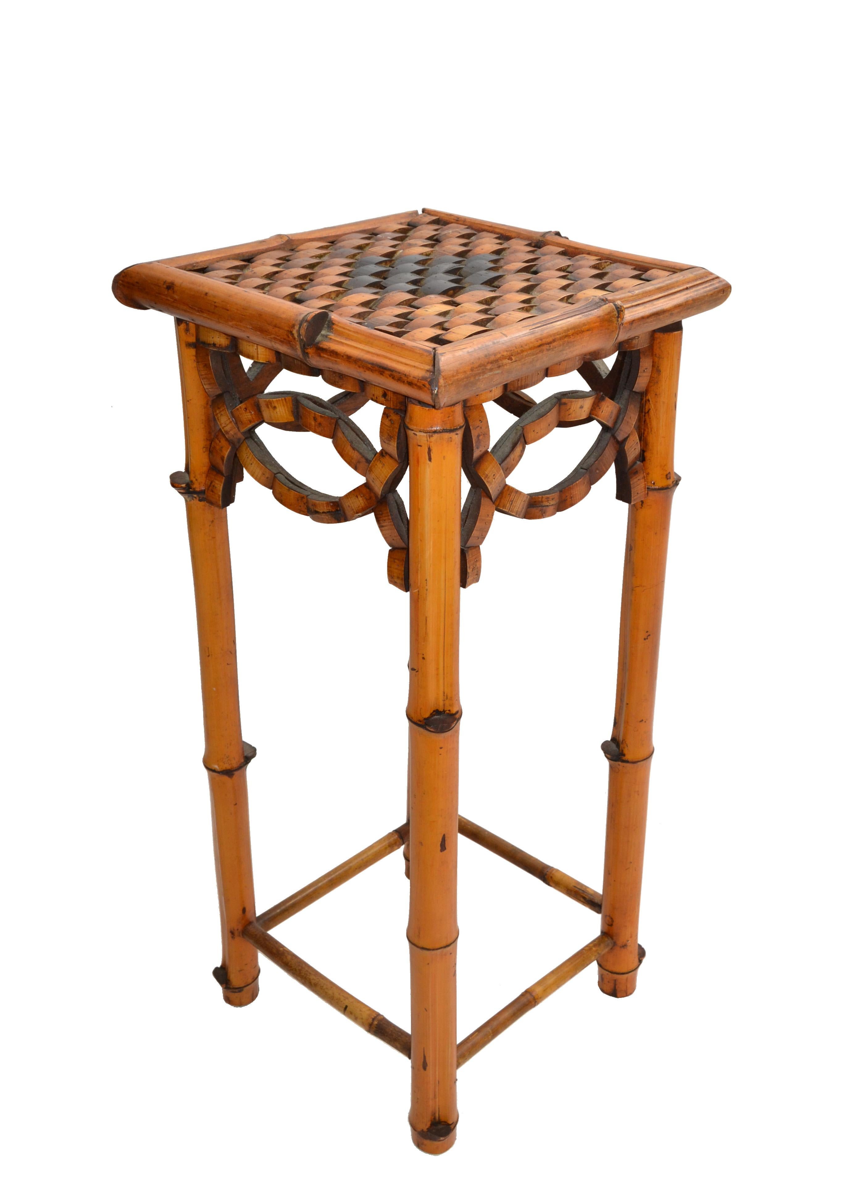 Square decorative handcrafted and handwoven Bohemian Style Mid-Century Modern bamboo and rattan side table and plant stand.
Great for your Florida style sunroom or porch.