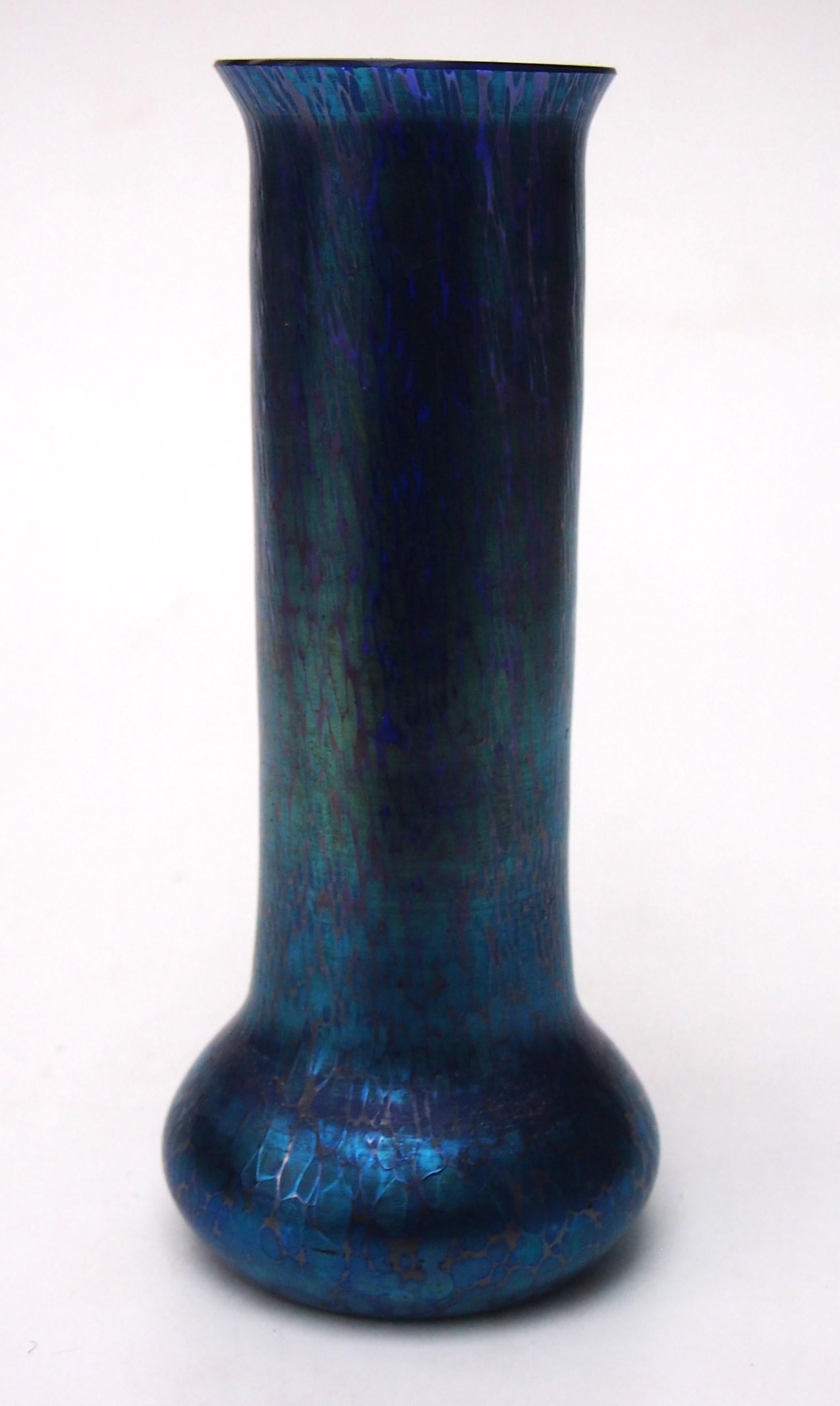 A fabulous Art Nouveau Cobalt (blue/gold on vibrant dark blue) Papillon (Butterfly wing) vase. This iridised finish was first created by Loetz in 1898 and dates to around that period. The vase is almost cylinder shape with a small flare to the top