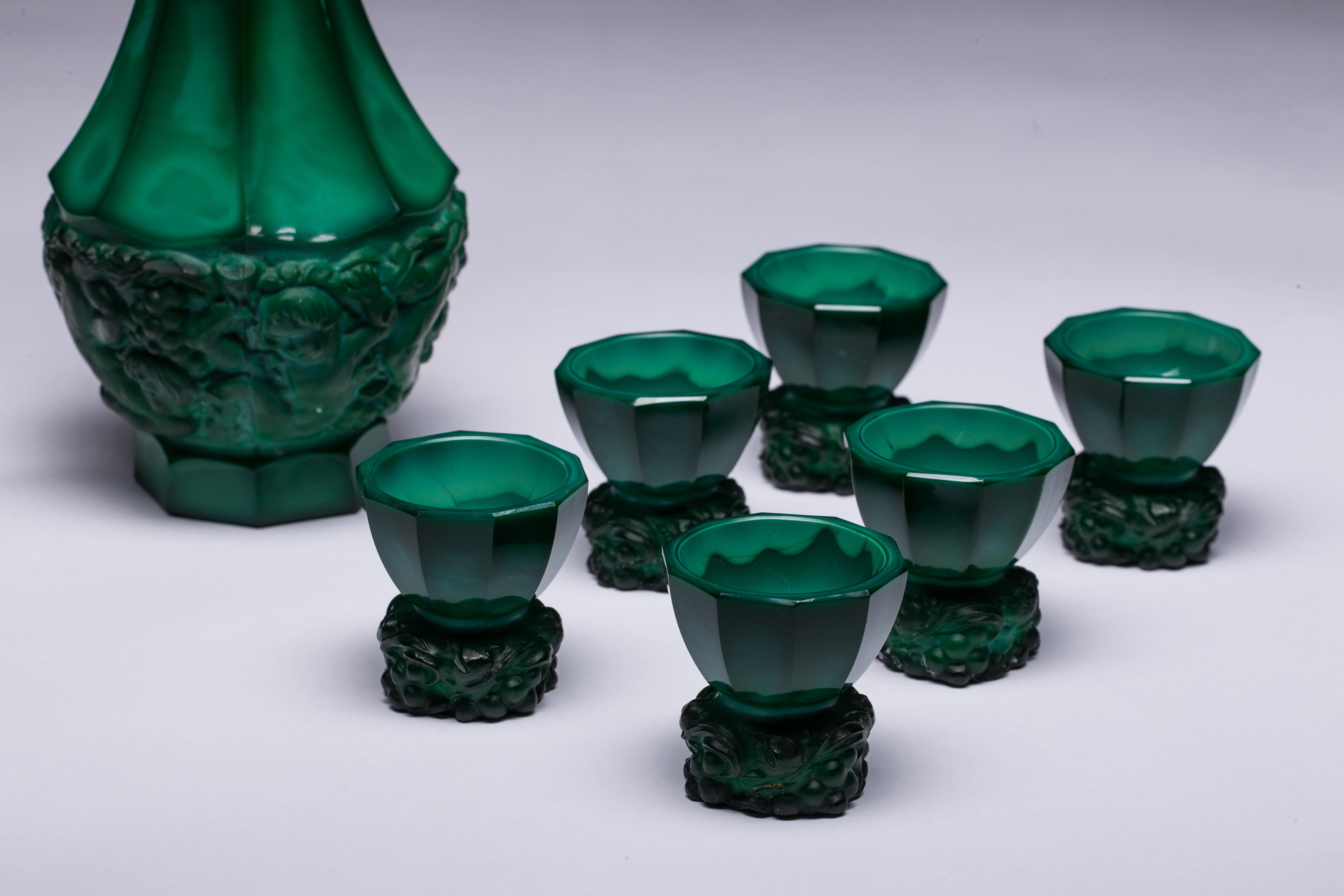 Carved Bohemian Malachite Glass Decanter and Six Cordials For Sale