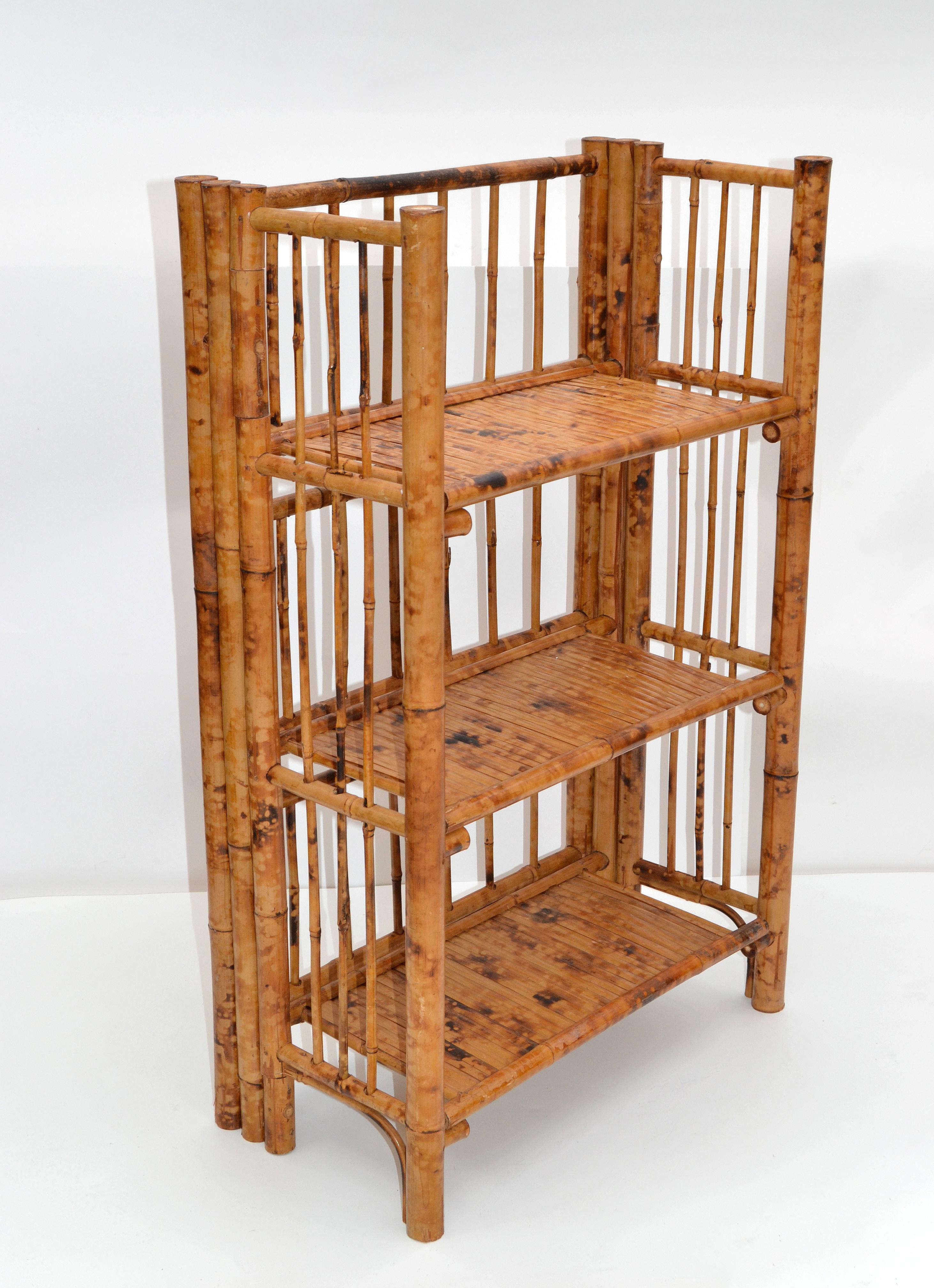 Bohemian style Mid-Century Modern handcrafted bamboo and cane folding storage, book or bathroom storage shelves.
The shelves are sturdy and easy to store.
Measure folded: Height 31.5 inches x depth 4 inches x width 20 inches.
