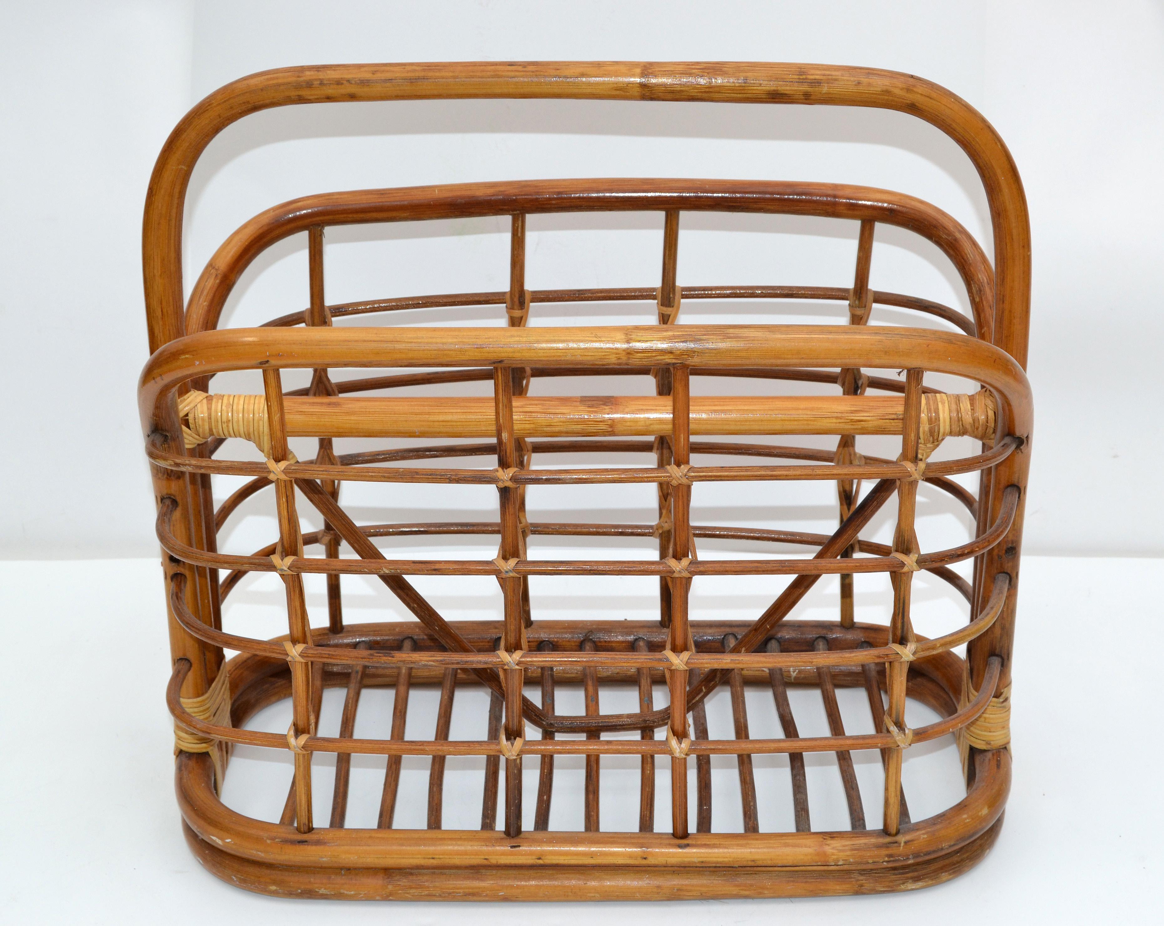 Mid-Century Modern boho chic handmade bamboo and cane magazine rack from the late 1970s.
It has been restored and is ready for a new Home.
Great for Your Florida Sun Room.
  