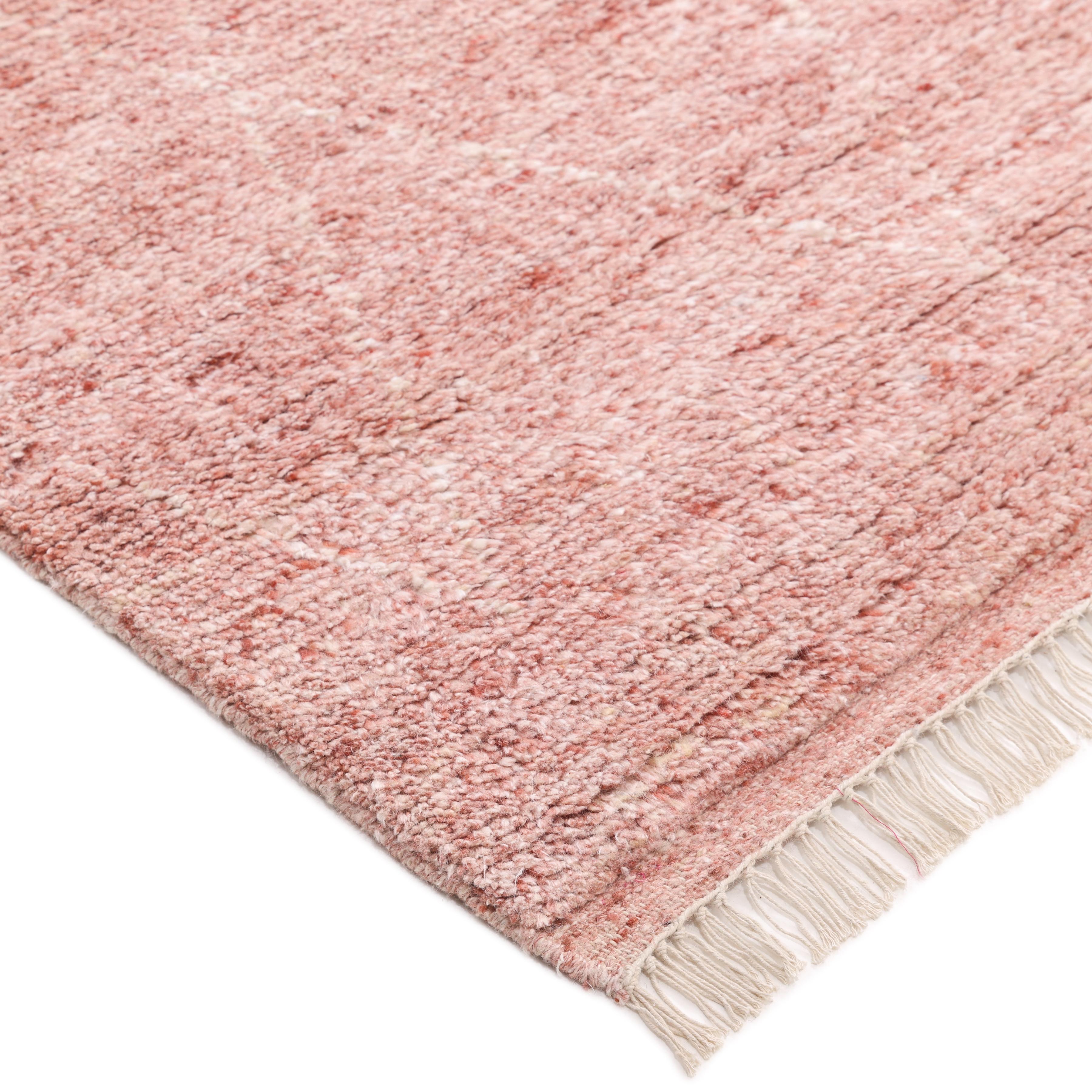 Moroccan rugs such as Beni Ourains and boucherouites are highly prized for their plush pile that makes walking barefoot a delight. Hand-knotted of sumptuous wool with designs inspired by centuries-old tribal motifs, the Shaggy Moroccan collection