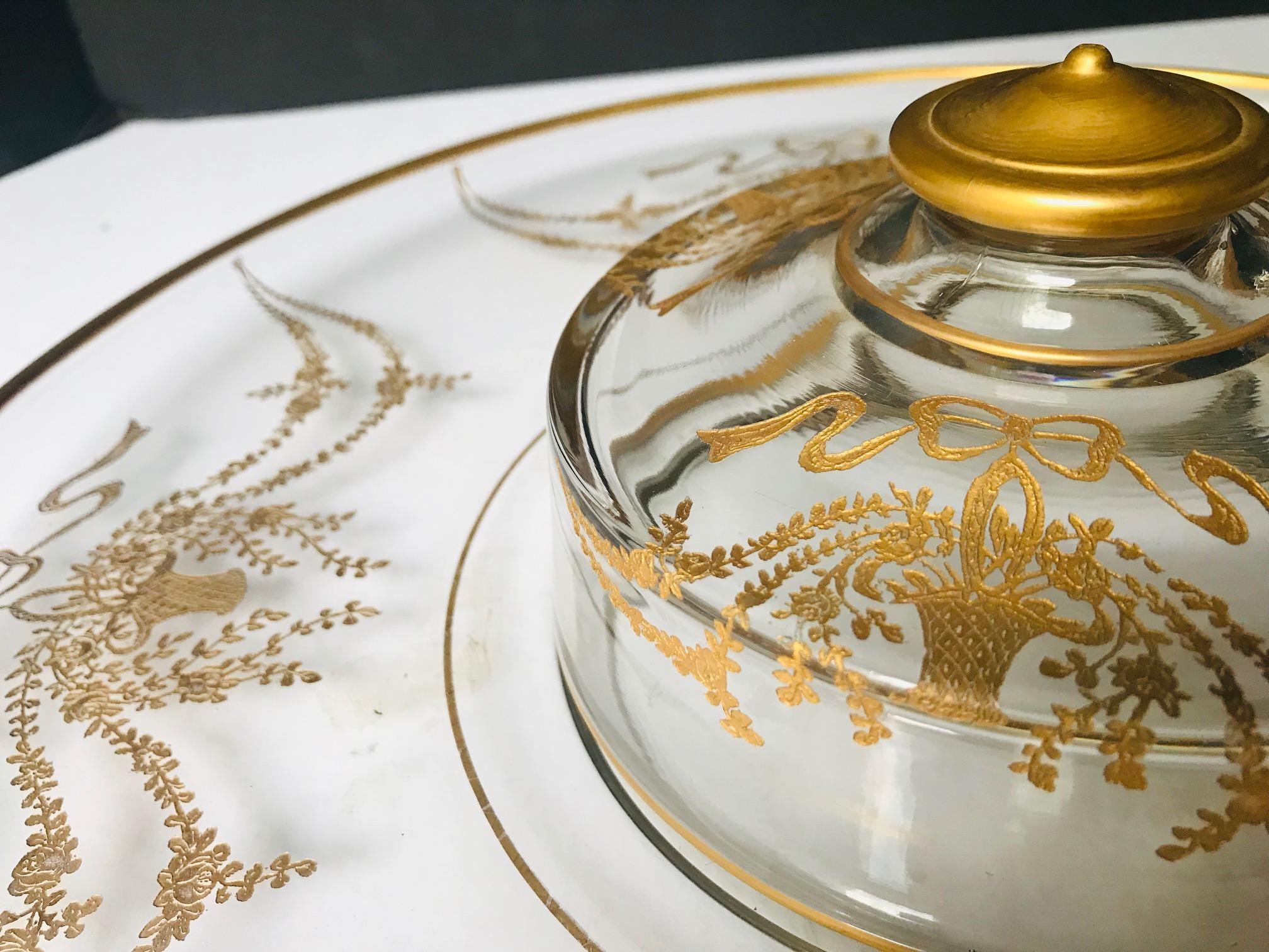 This offer is for a gorgeous and very large Moser Art Glass platter. The serving platter and center cover are intaglio cut with heavy gold inlay. The cut and elaborately gilded decor shows a garland and flower motif. The amazing quality of cutting