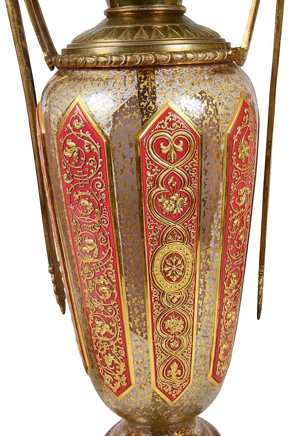 Gilt Bohemian overlay glass lamps, circa 1890. For Sale