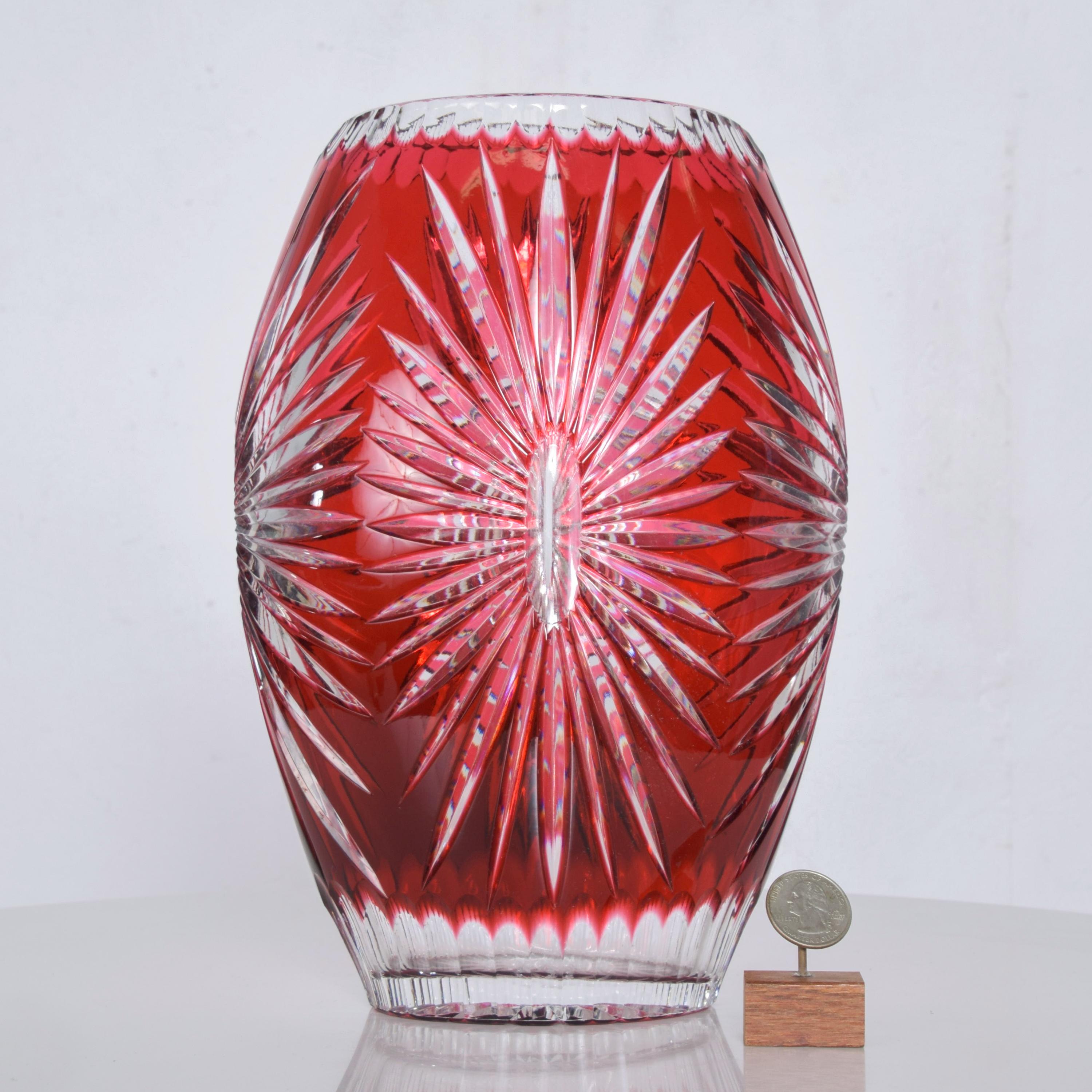 From Hungary Bohemian ruby red crystal clear cut vase
No label no signature present
Presents in the style of Ajka Claresta, Hungary
Dimensions: 10.25