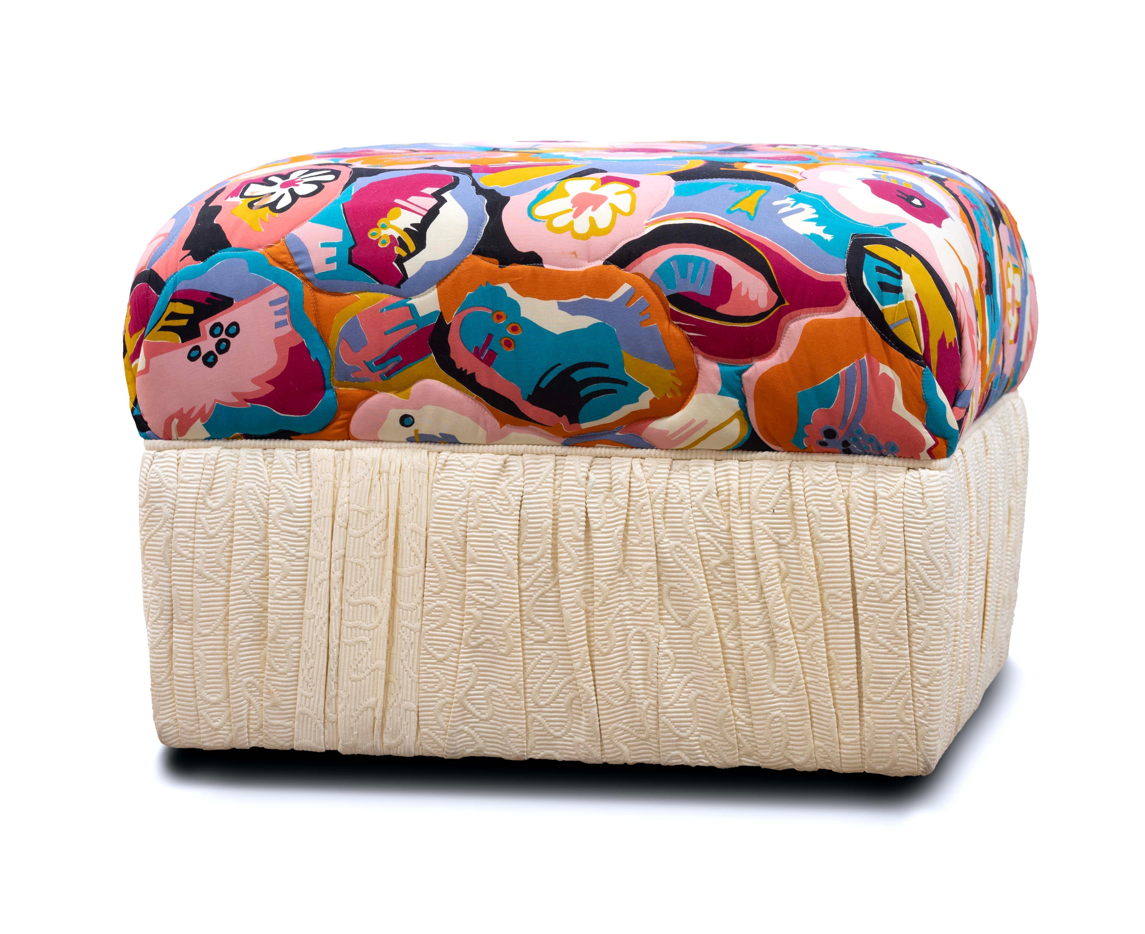 A Bohemian Roche Bobois Style Floral Rolling Ottoman. The perfect piece to transform your boho style room. With the Roche Bobois style fabric and the intricate upholstered embossed fabric on the skirt of the ottoman, this piece is for sure to make a