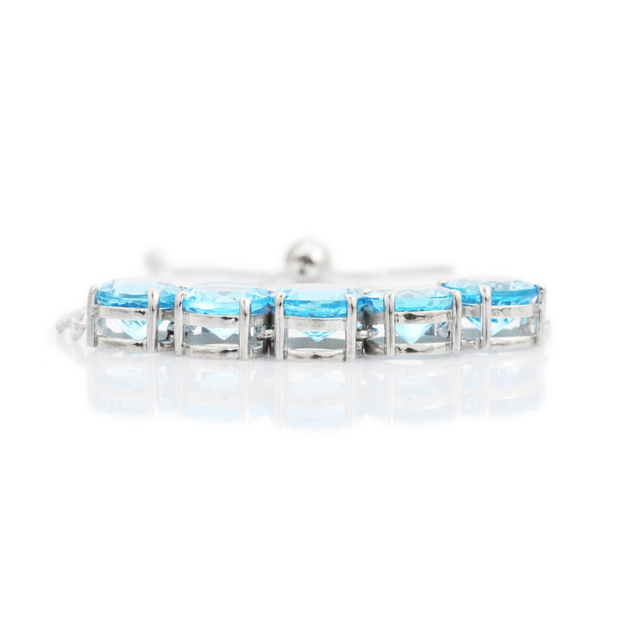 Women's Bohemian Round Cut Blue Topaz December Birthstone Bolo Silver Bracelet for Her For Sale