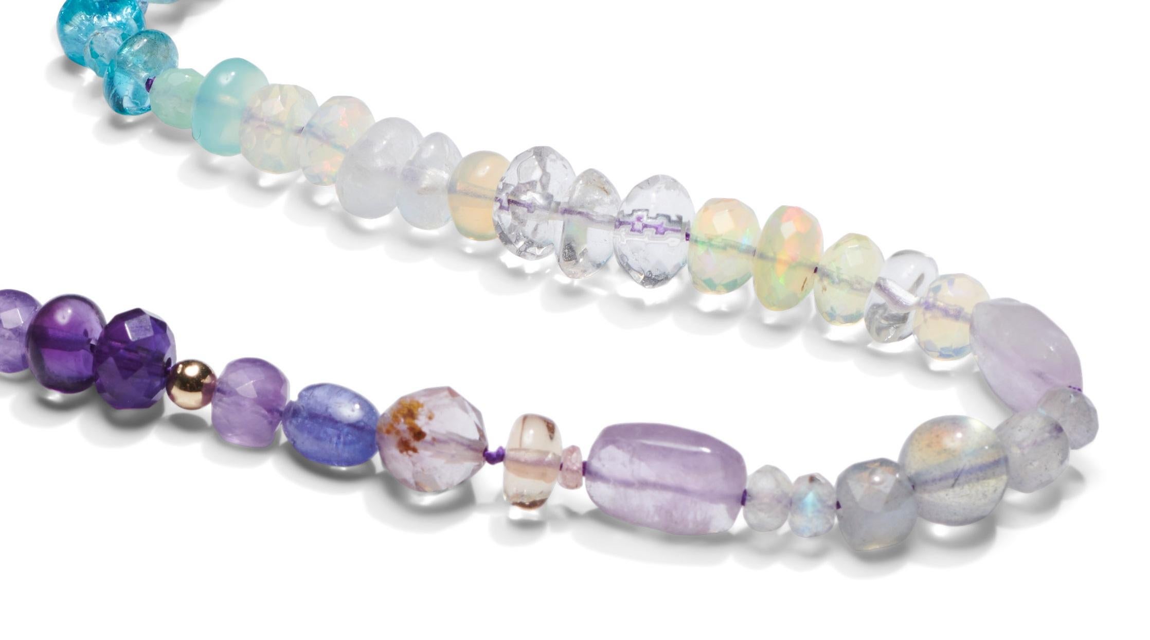 Enchanting multi gemstone necklace, methiciously hand knotted with precious stones like opal and tourmalines.

Gemstones included;

• Swiss topaz
• Tanzanite,
• Apatite
• Ethiopian Opals
• Ametrine
• Labradorites
• Iolite
• African amethysts
•