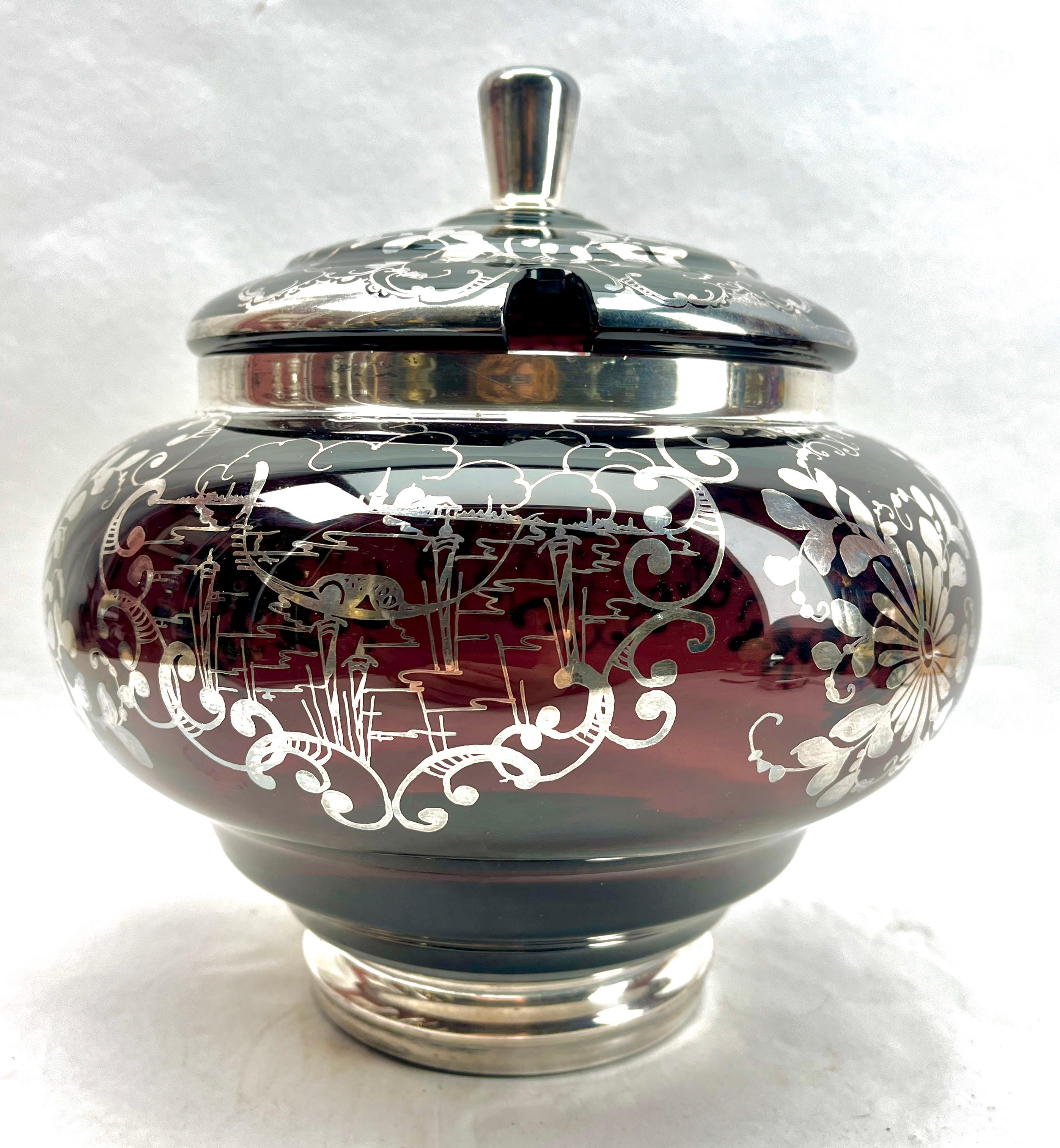 Antique Bohemian Silver Edging Hand-Crafted Glass Punch Bowl with Lid 
Photography fails to capture the colour en the beauty of the piece.
In real-time, they look stunning. 

The piece is in perfect condition with no repair or Restoration.


