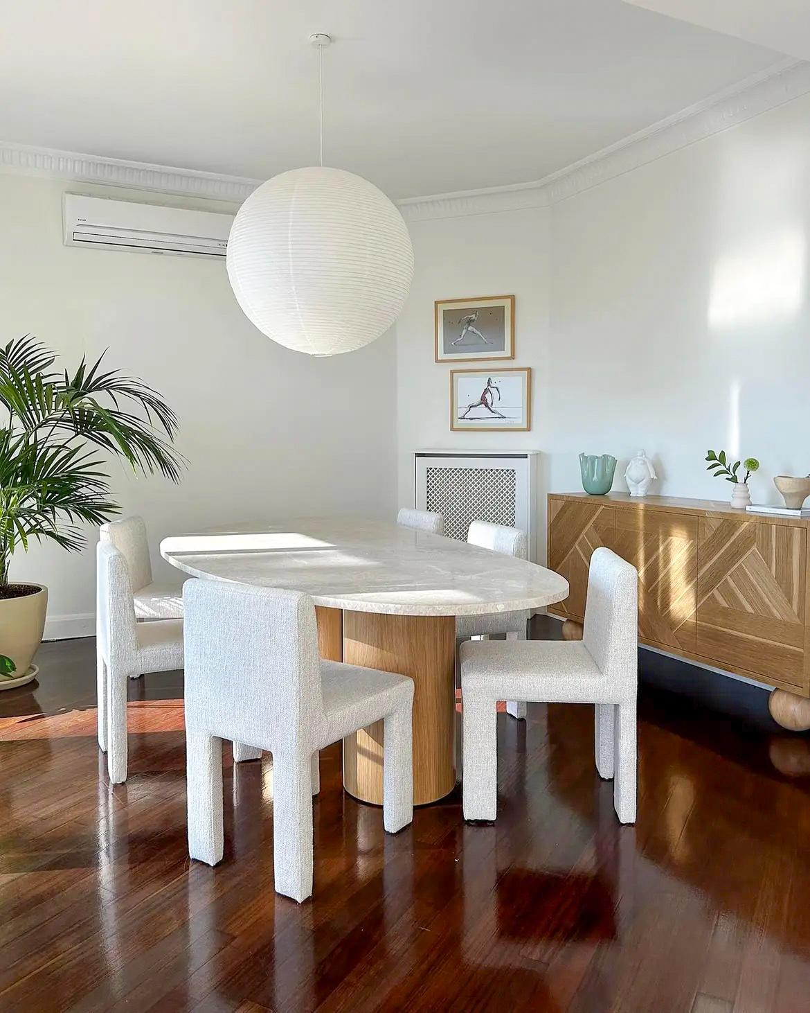 Travertine Dining Table with Wooden Legs

Type of Marble: Travertine
Dimensions: 79