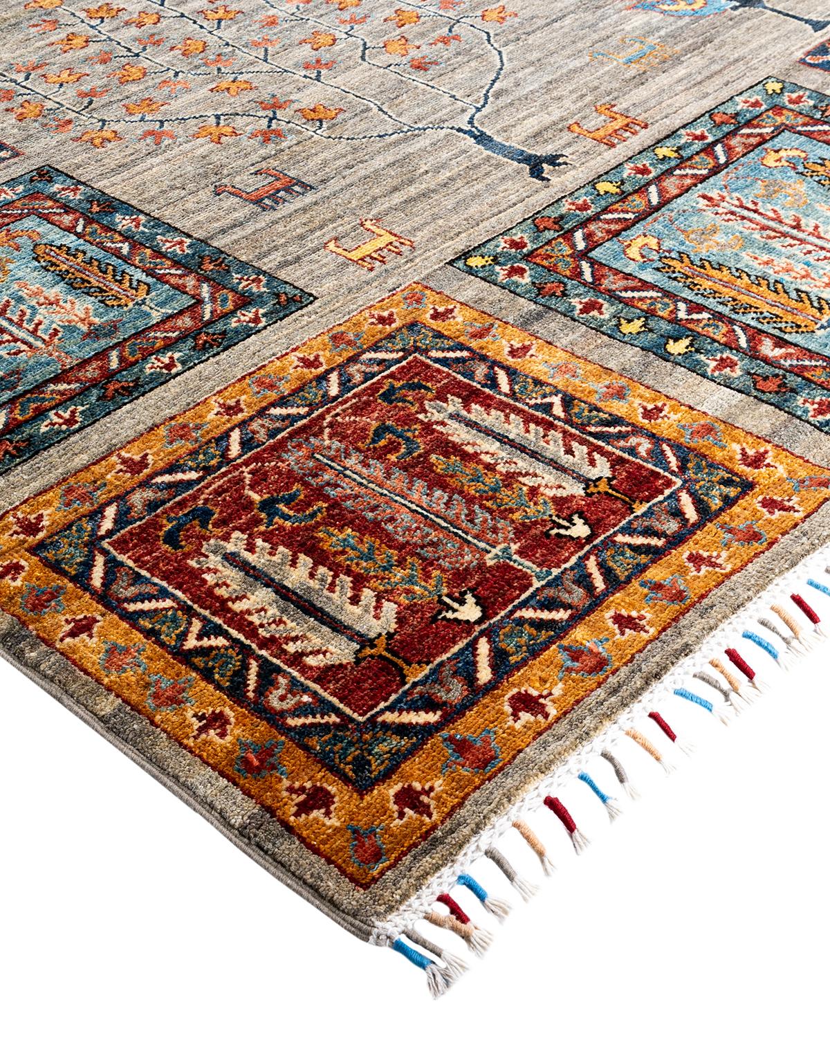 The rich textile tradition of western Africa inspired the Tribal collection of hand-knotted rugs. Incorporating a medley of geometric motifs, in palettes ranging from earthy to vivacious, these rugs bring a sense of energy as well as plush texture