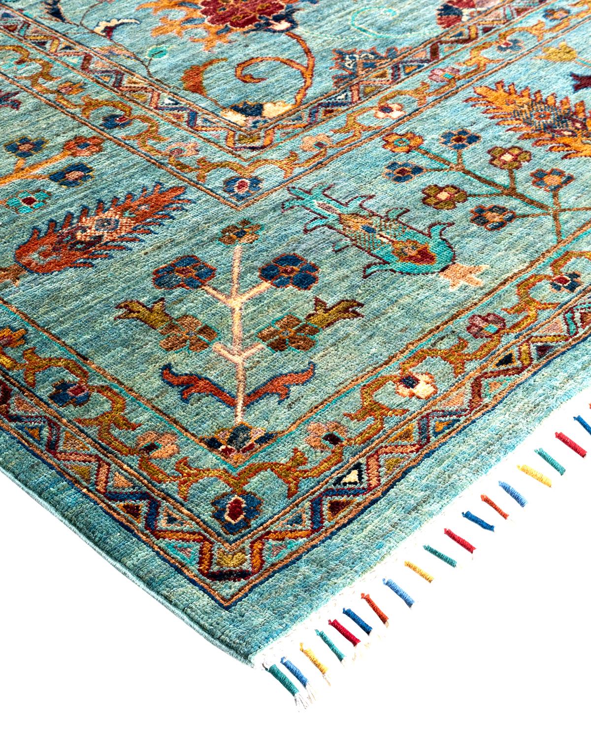 The rich textile tradition of western Africa inspired the Tribal collection of hand-knotted rugs. Incorporating a medley of geometric motifs, in palettes ranging from earthy to vivacious, these rugs bring a sense of energy as well as plush texture