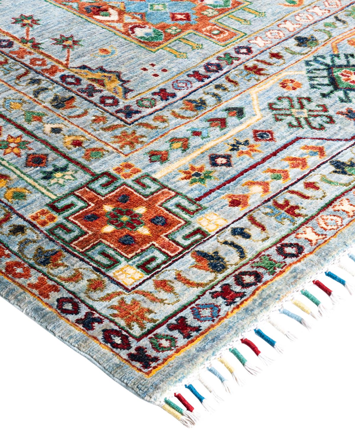 The rich textile tradition of western Africa inspired the Tribal collection of hand-knotted rugs. Incorporating a medley of geometric motifs, in palettes ranging from earthy to vivacious, these rugs bring a sense of energy as well as plush texture