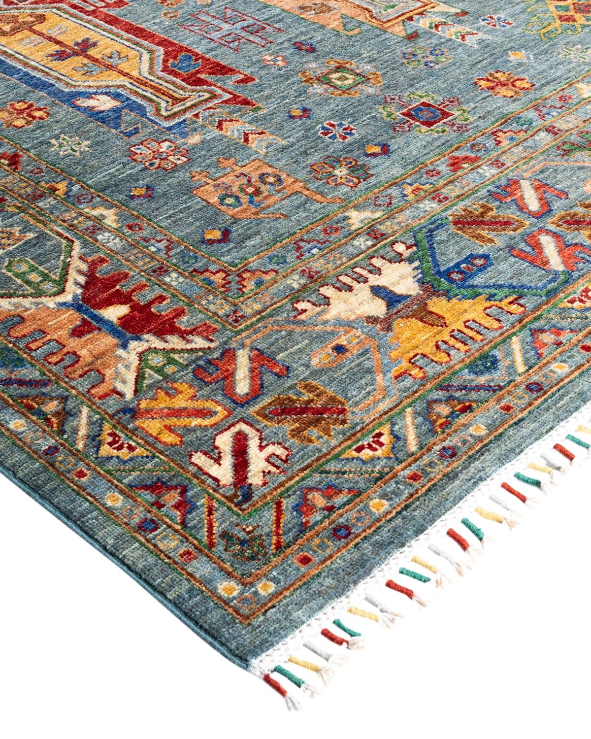 The rich textile tradition of western Africa inspired the Tribal collection of hand-knotted rugs. Incorporating a medley of geometric motifs, in palettes ranging from earthy to vivacious, these rugs bring a sense of energy as well as plush texture