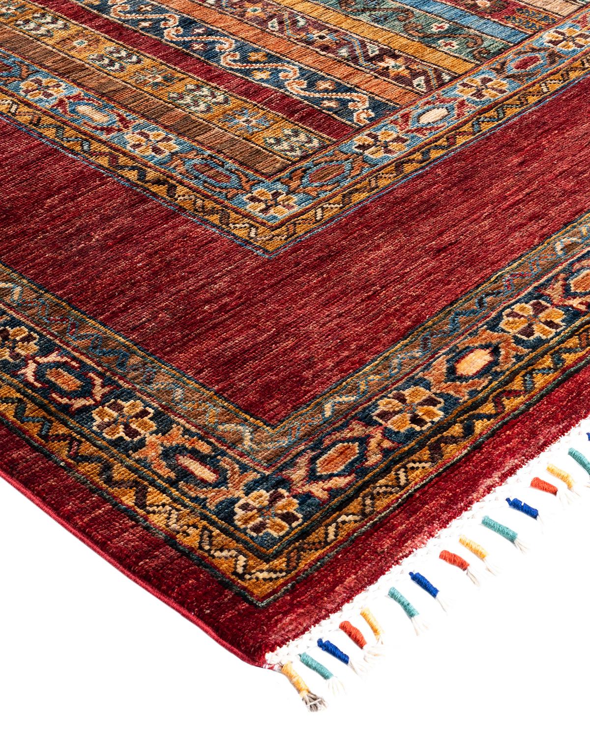 The rich textile tradition of western Africa inspired the Tribal collection of hand-knotted rugs. Incorporating a medley of geometric motifs, in palettes ranging from earthy to vivacious, these rugs bring a sense of energy as well as plush texture