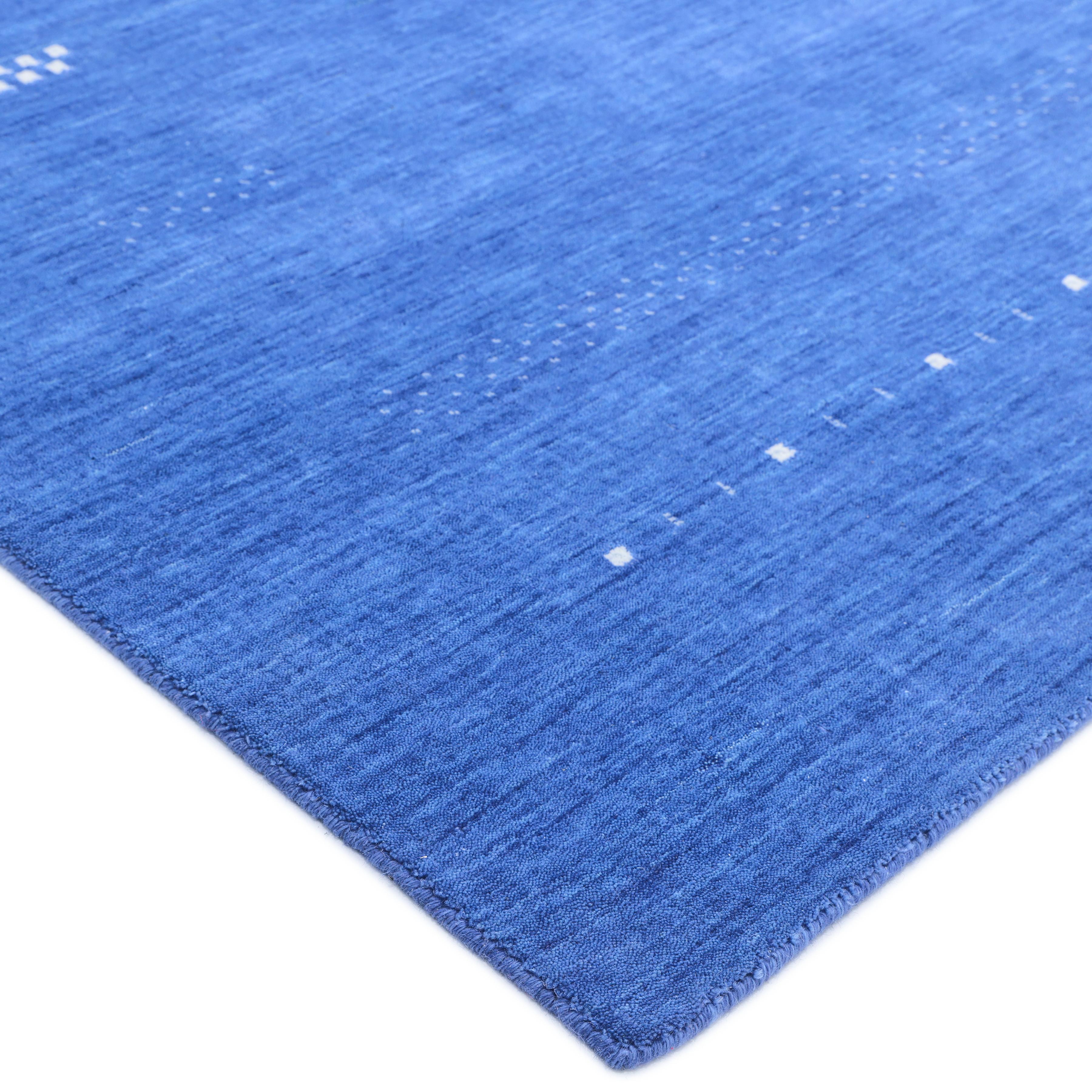 The nomads of Iran’s Zagros Mountains wove the original gabbeh rugs in part to keep themselves warm on cold winter nights. In tribute to those original designs, this collection boasts a sumptuous pile that will pamper your bare feet, making these