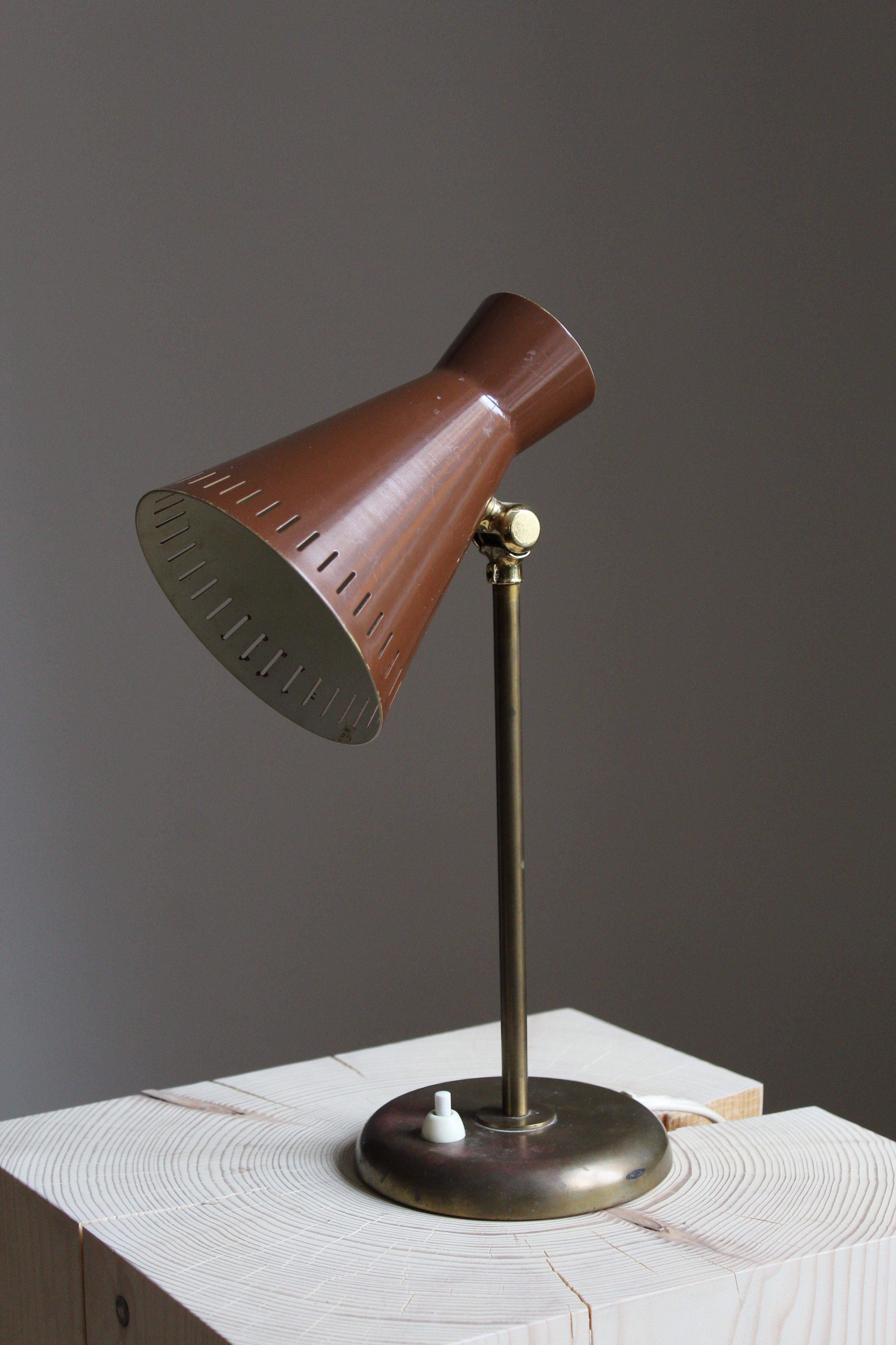 An adjustabe table lamp or desk light. In brass, screen in brown and white lacquered metal. Produced by Böhlmarks, Sweden, 1950s.

Other designers of the period include Josef Frank, Paavo Tynell, Hans Bergström, Böhlmarks, and Jean Royère.