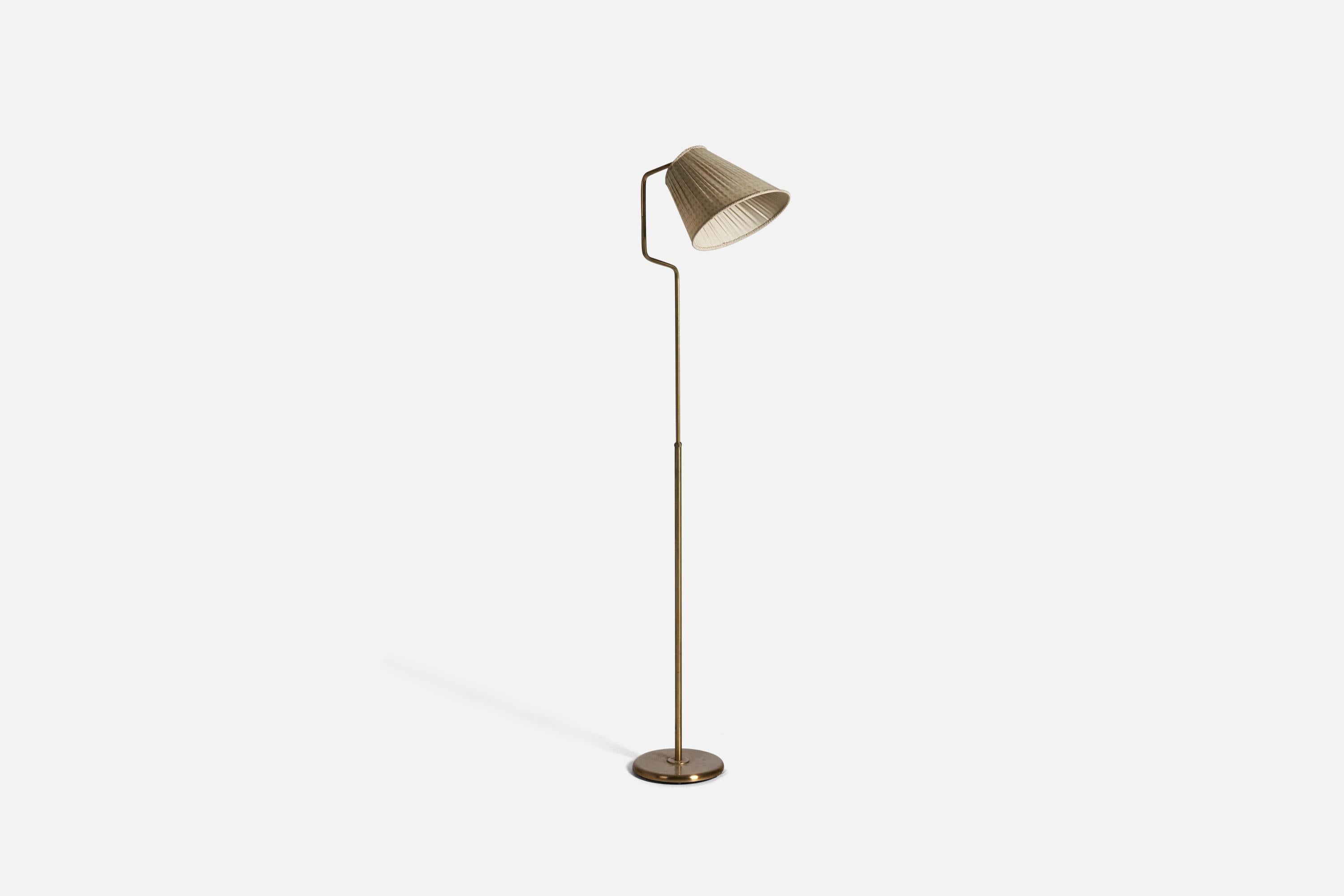 An adjustable, brass and white fabric floor lamp; design and production attributed to Böhlmarks, Sweden, 1940s. 

Variable dimensions, measured as illustrated in the first image.

Socket takes standard E-26 medium base bulb.
There is no maximum