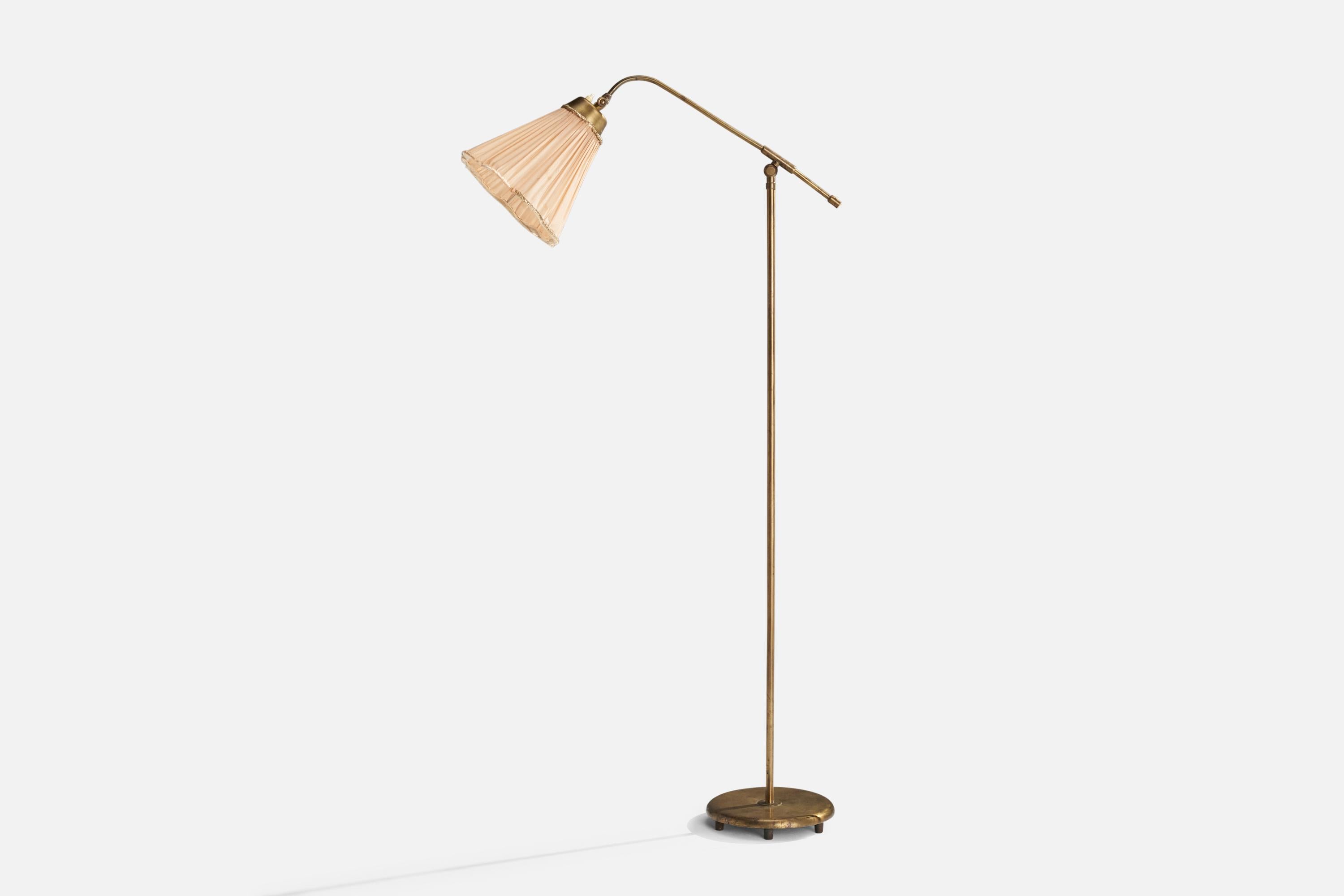 An adjustable brass and orange fabric floor lamp produced by Böhlmarks, Sweden, 1940s.

Dimensions variable 
Overall Dimensions (inches): 52.25” H x 9.25” W x 26.5” D
Stated dimensions include shade.
Bulb Specifications: E-26 Bulb
Number of Sockets: