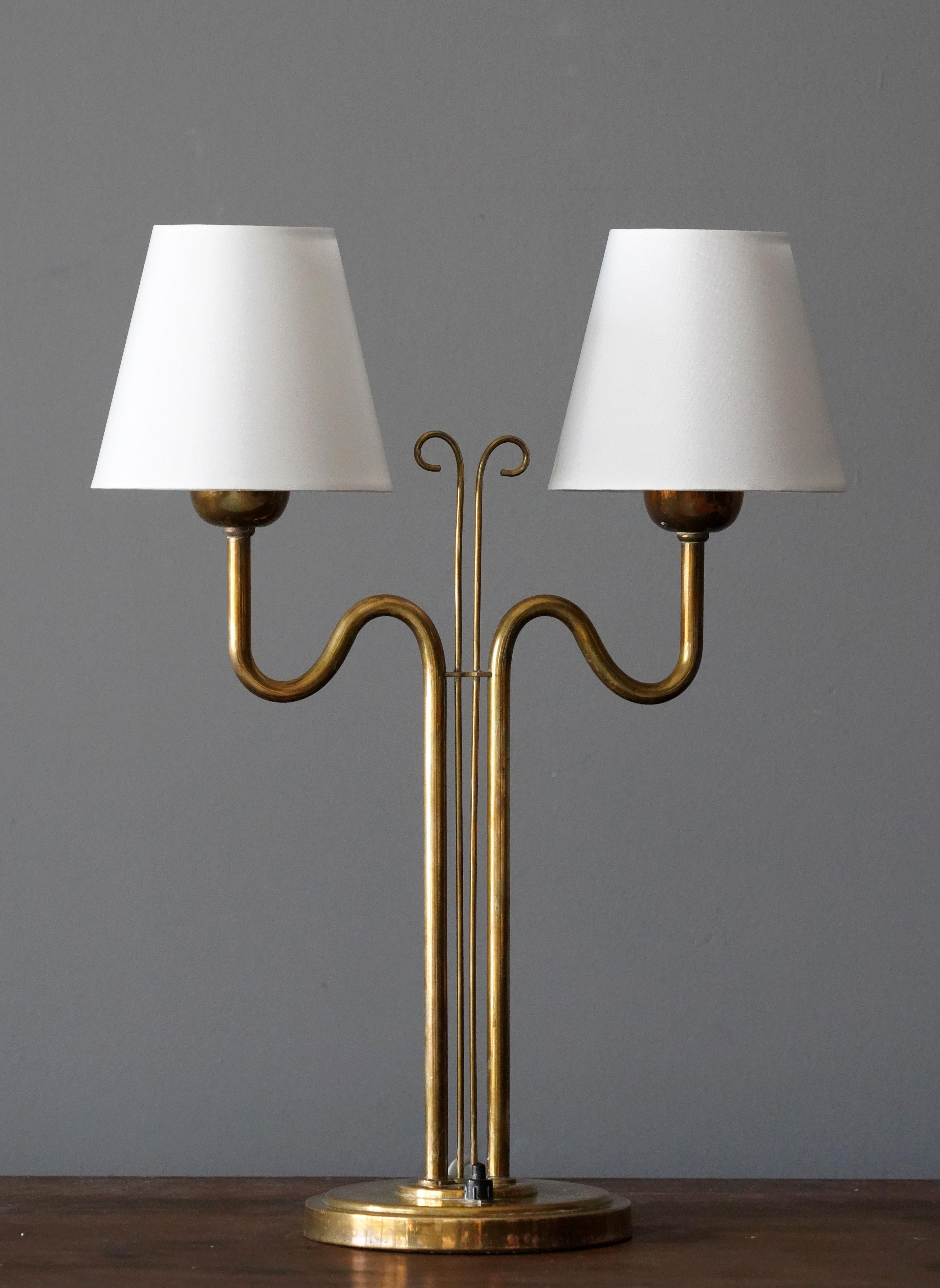 A table lamp or desk light. In brass. Produced by Böhlmarks, Sweden, 1940s.

Other designers of the period include Josef Frank, Paavo Tynell, Hans Bergström, Böhlmarks, and Jean Royère.