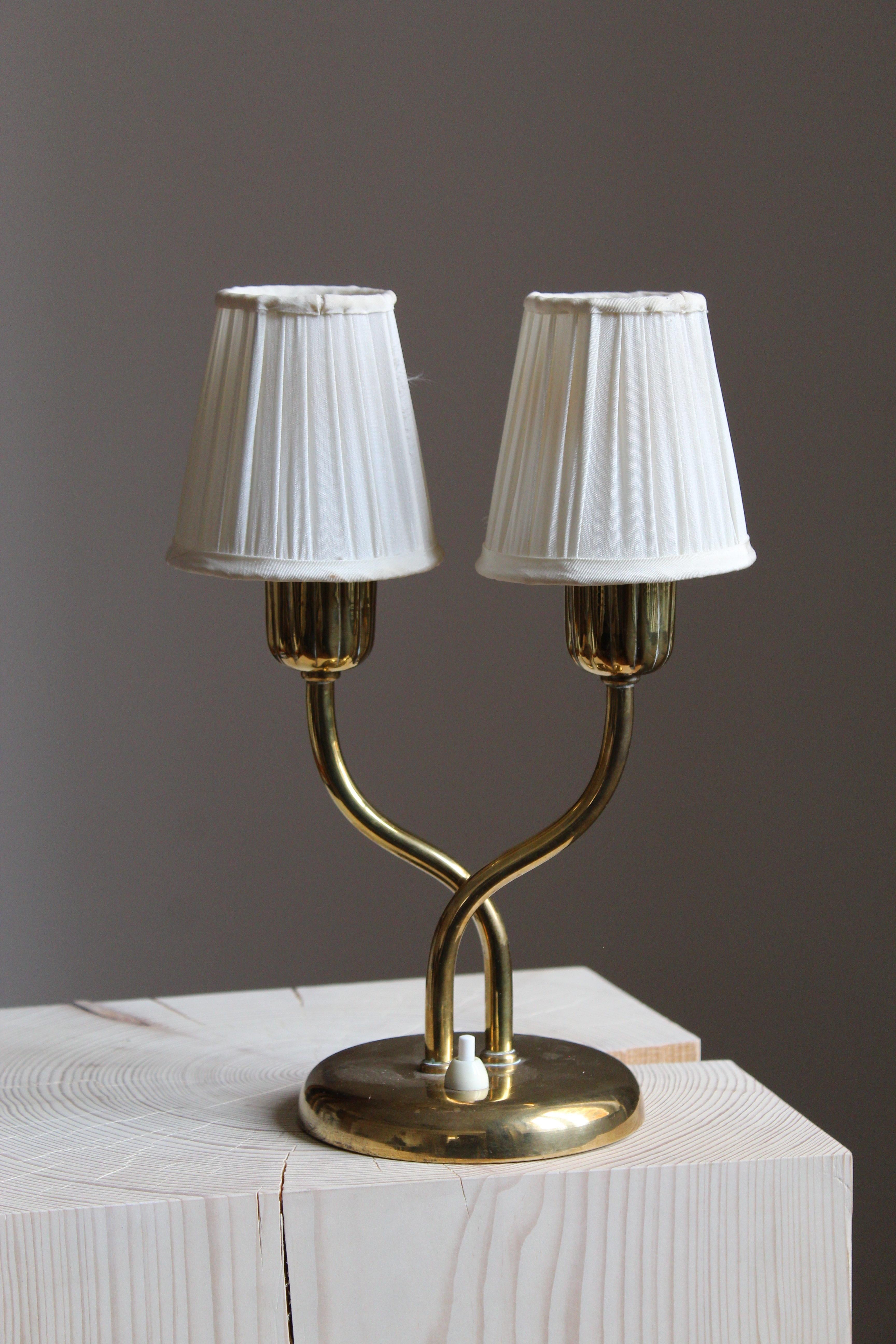 A table lamp or desk light. In brass. Produced by Böhlmarks, Sweden, 1940s.

Other designers of the period include Josef Frank, Paavo Tynell, Hans Bergström, Böhlmarks, and Jean Royère.