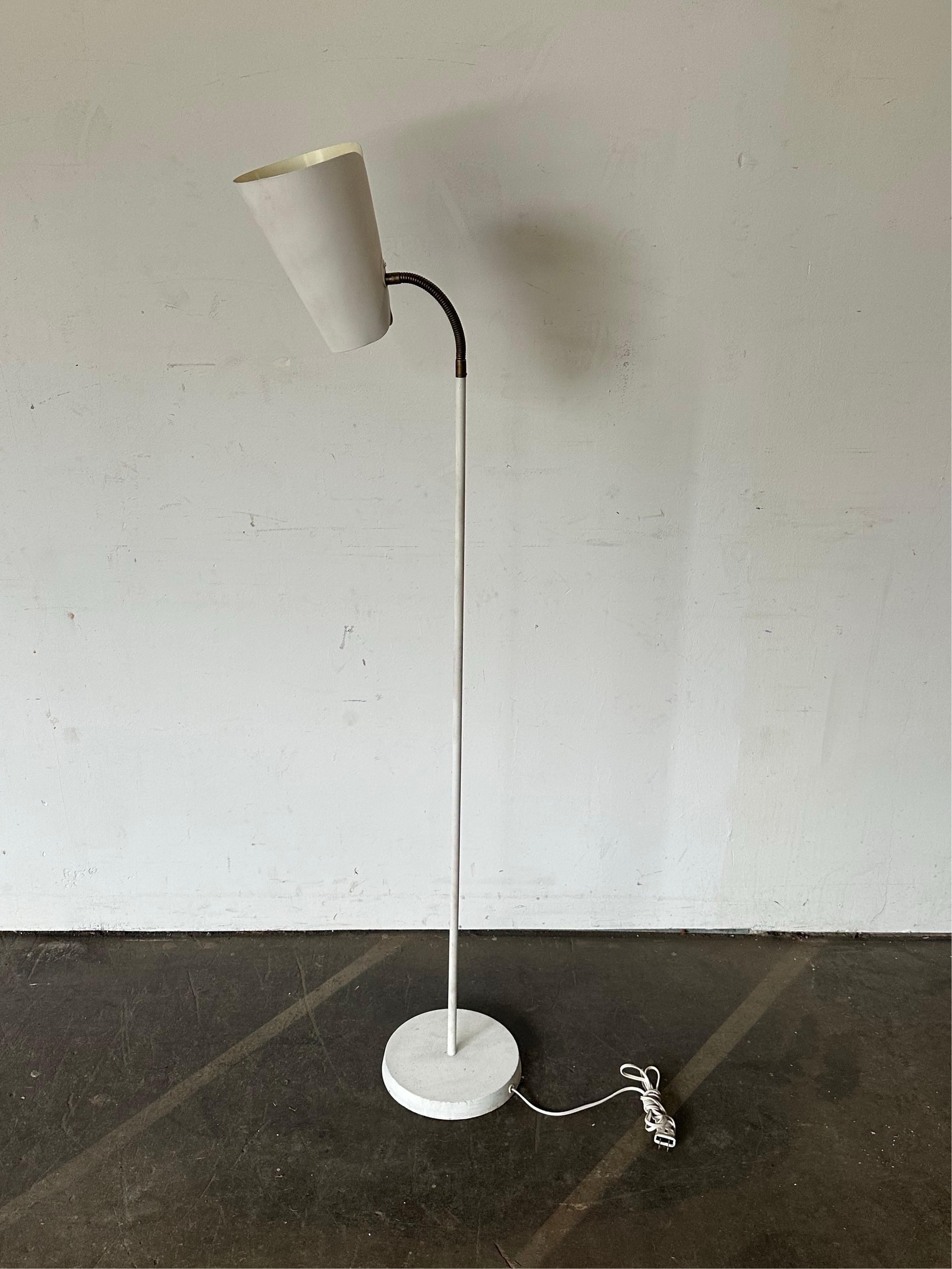 Swedish Mid-Century Modern metal floor lamp by Bohlmarks, adjustable goose neck on circular base; labeled on base and shade interior. 48