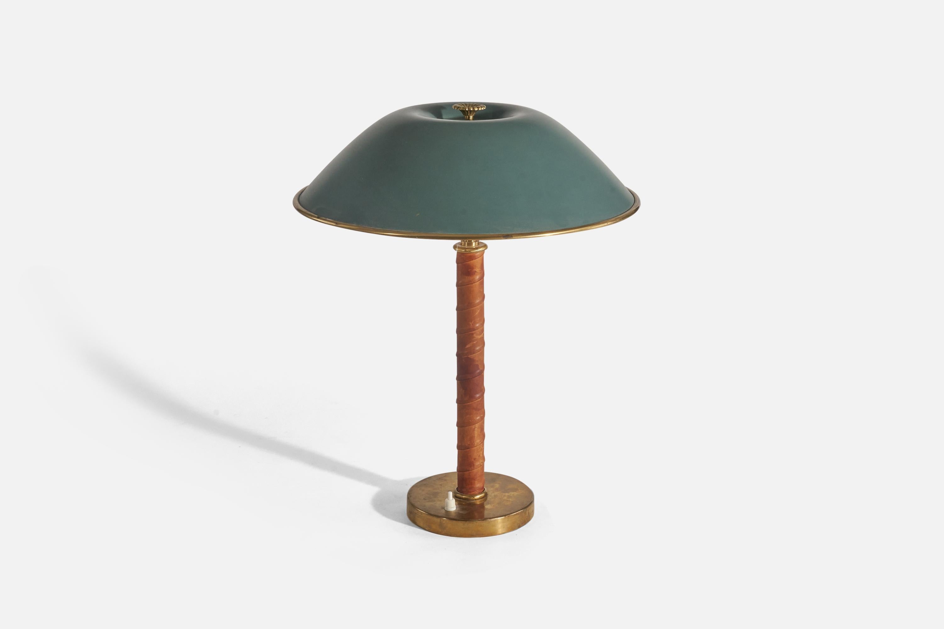 A brass, leather and green-lacquered metal table lamp designed and produced by Böhlmarks, Sweden, c. 1940s. 

Socket takes standard E-26 medium base bulb.
There is no maximum wattage stated on the fixture.