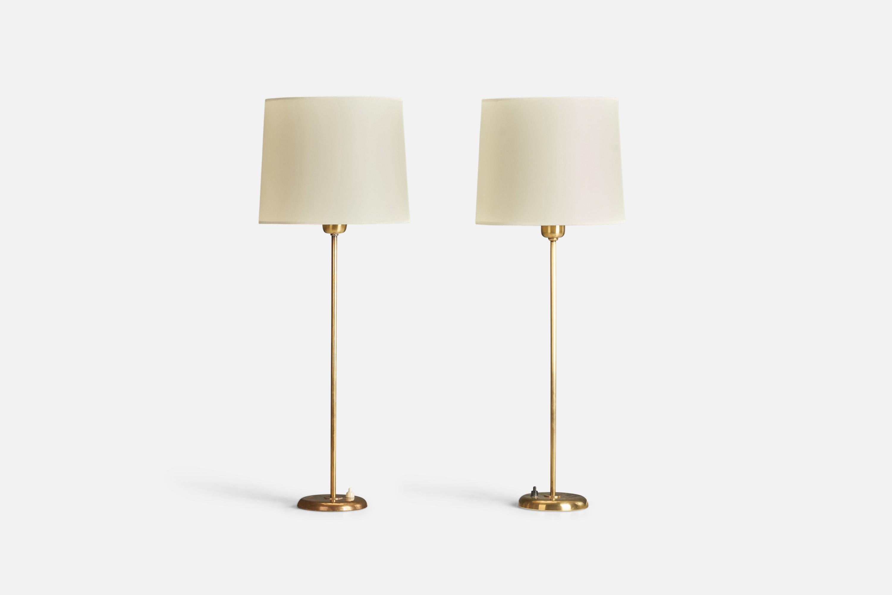 A pair of brass table lamps designed and produced by Böhlmarks, Sweden, 1940s.

Dimensions of lamp (inches) : 20.43 x 4.6 x 4.6 (Height x width x depth)
Dimensions of lampshade (inches) : 9 x 10 x 8.25 (Top Diameter x bottom diameter x