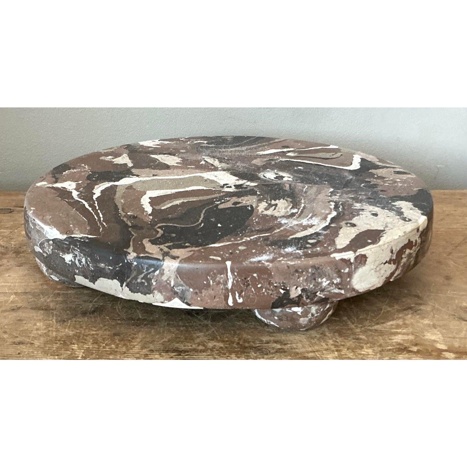 Ground your decor with the organic elegance of this vintage Scagliola plinth. Expertly handcrafted using the traditional technique of pigmented plaster to simulate natural stone, this display riser features a mesmerizing swirl of earth tones,