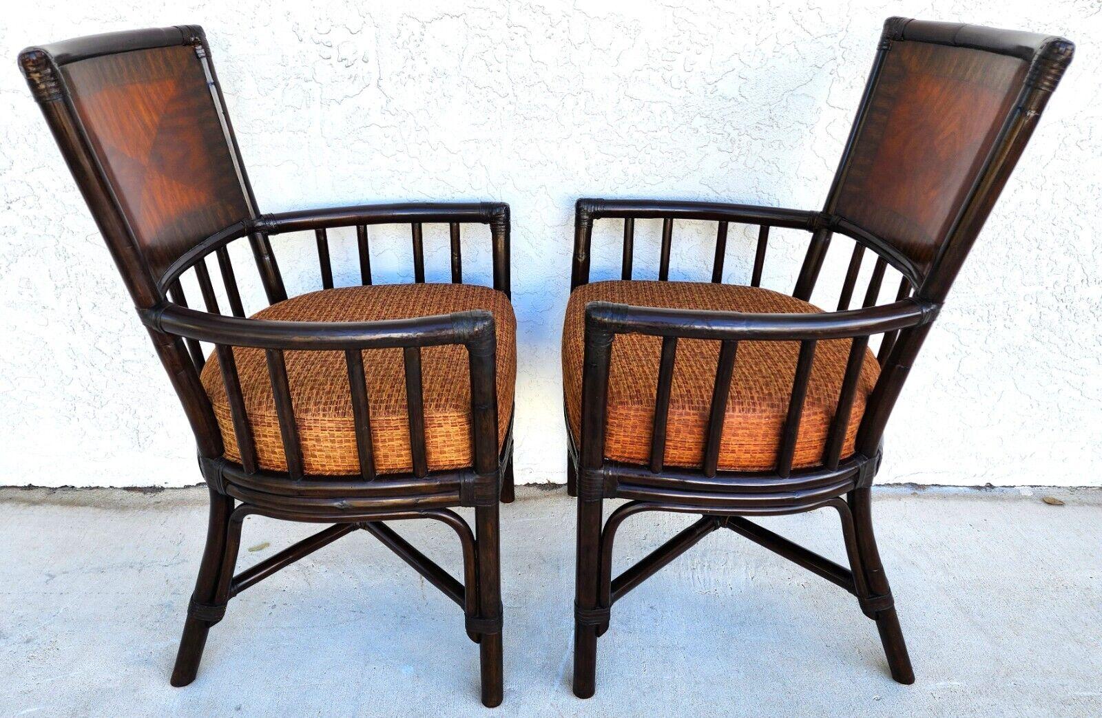 For FULL item description click on CONTINUE READING at the bottom of this page.

Offering One Of Our Recent Palm Beach Estate Fine Furniture Acquisitions Of A
Pair of Boho Bamboo Accent Dining Armchairs by PALECEK

Approximate Measurements in