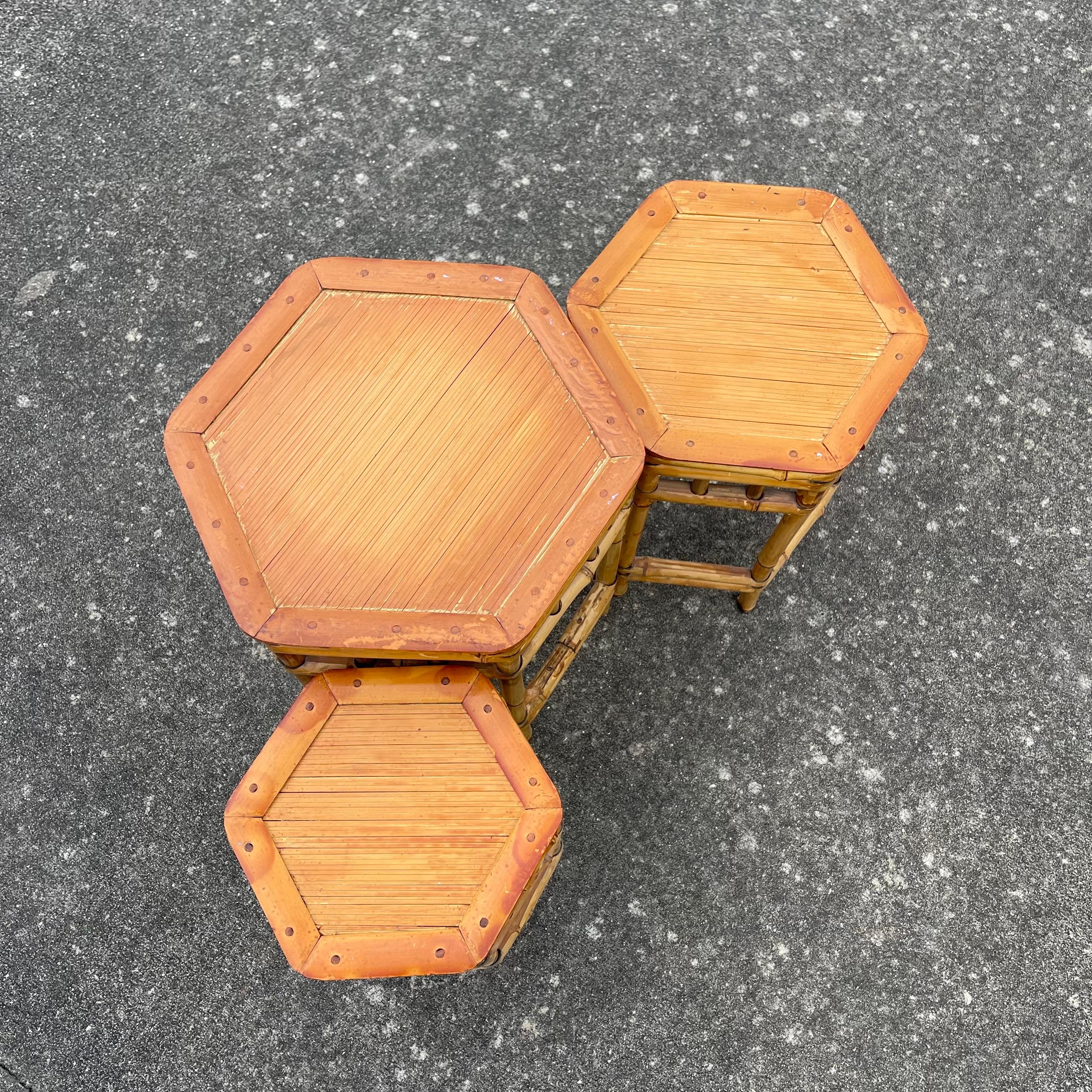 20th Century Boho Bamboo Rattan Staggered Nesting Stacking Tables or Plant Stands, Set of 3 For Sale