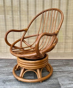 Boho Bent Rattan Swivel Lounge Chair in the Paul Frankl's Manner. Circa 1970s