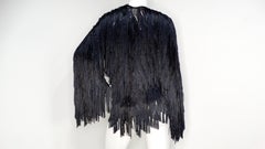 Italienische Jacke mit schwarzem Seidenband und Fransen aus Häkelarbeit