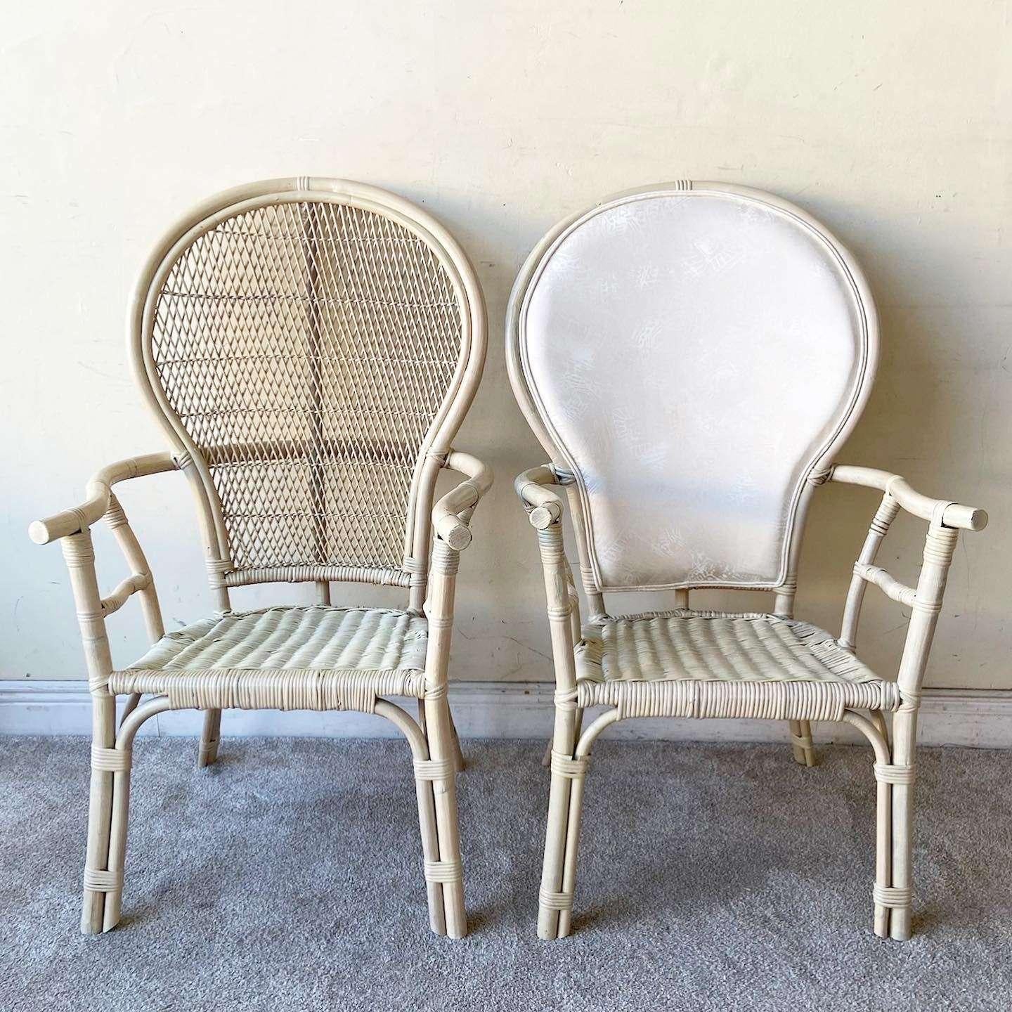 Incredible set of 6 exceptional boho chic dining chairs. Each features a balloon back with a bamboo rattan frame. Two of the chairs have an upholstered back and the other 4 do not.

Seat height is 16.0 in