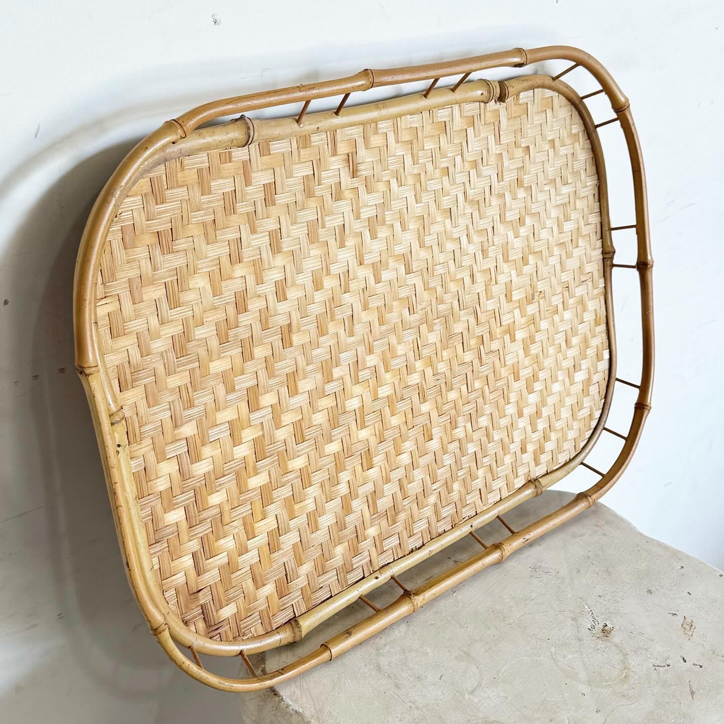 Discover the perfect blend of natural elegance and practical design with our Boho Chic Bamboo and Herringbone Tray. This beautifully crafted tray features a sturdy bamboo frame, providing a sustainable and durable base. The interior is adorned with