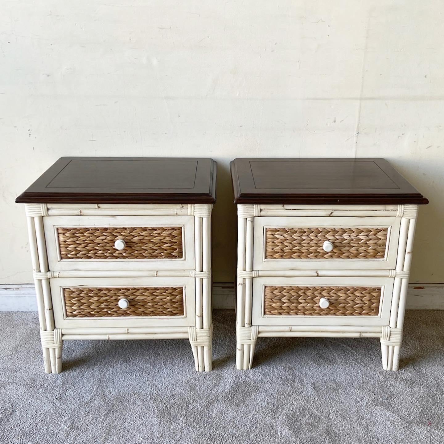 Amazing pair of bohemian nighstands. Each feature a brown wooden top with an off white/cream bamboo rattan frame and sea grass drawer panels.