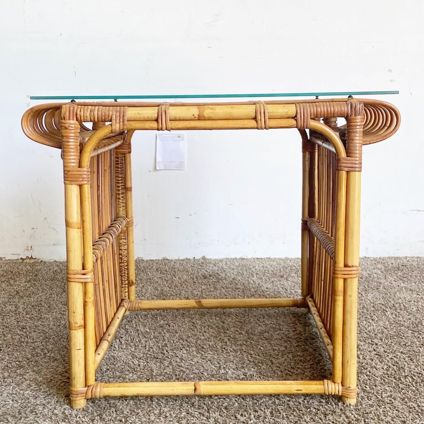 Enhance your decor with the Boho Chic Bamboo Glass Top Side Table. Featuring a sturdy bamboo base and a sleek glass top, this table is the epitome of style and functionality. Its versatile design makes it an ideal addition to various decor styles,