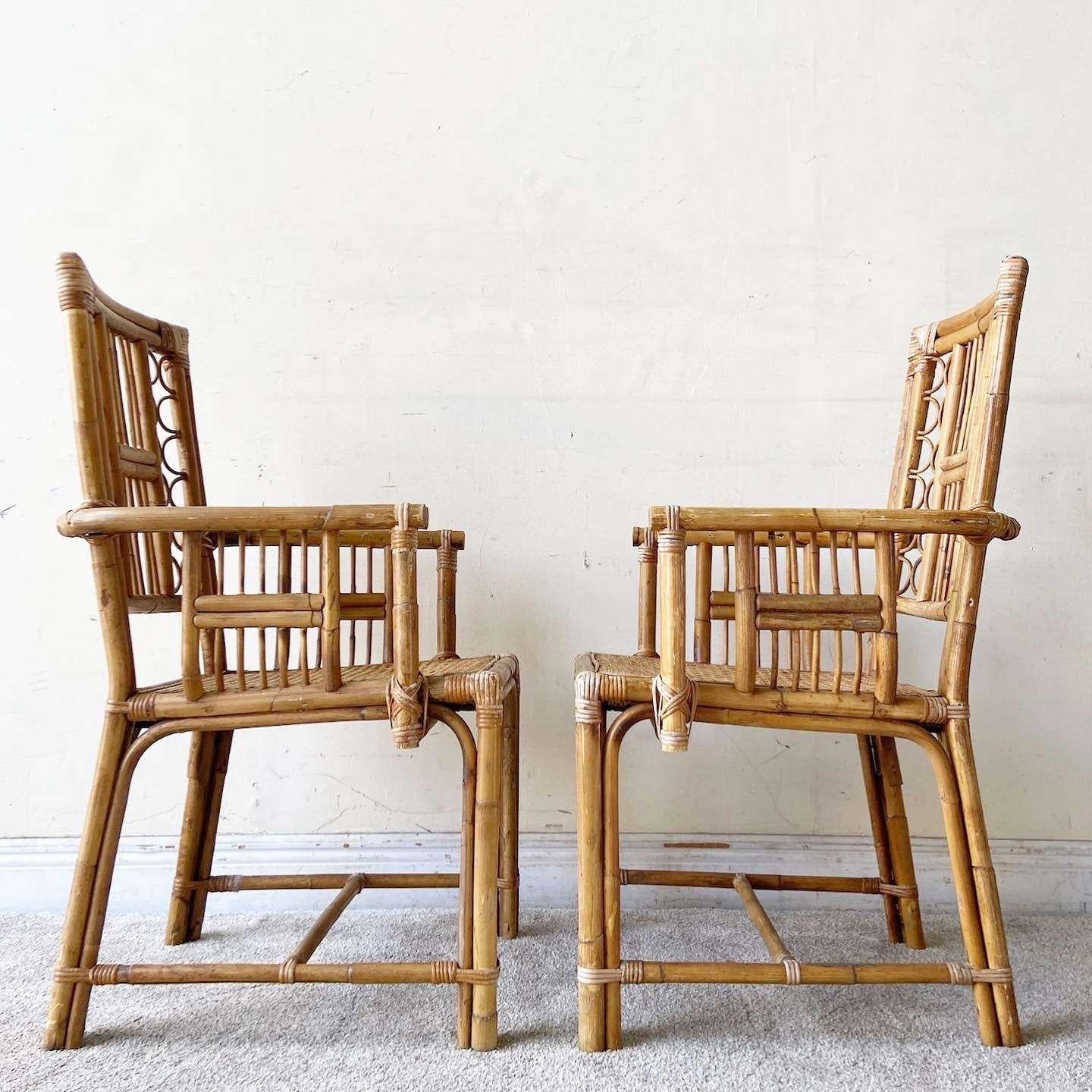 Boho Chic Bamboo Rattan and Cane Dining Chairs Attributed to Brighton - a Pair In Good Condition For Sale In Delray Beach, FL
