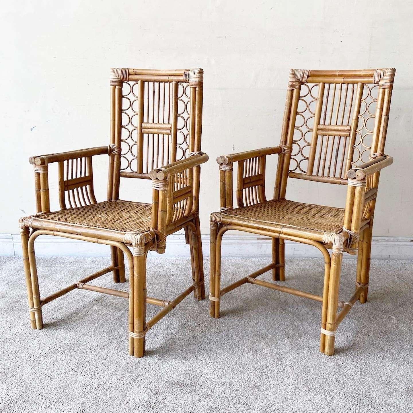 Late 20th Century Boho Chic Bamboo Rattan and Cane Dining Chairs Attributed to Brighton - a Pair For Sale