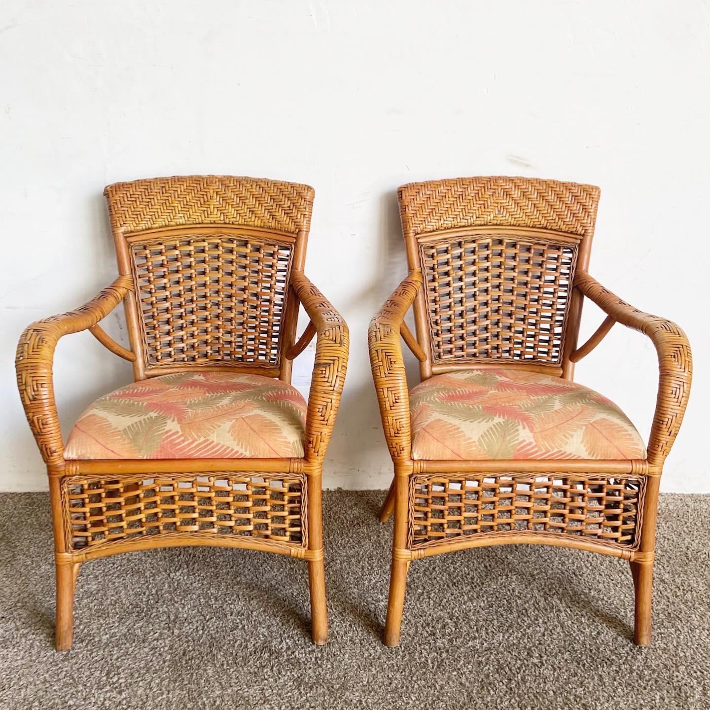 Introduce relaxed elegance to your dining room with these Boho Chic Bamboo Rattan and Wicker Dining Arm Chairs. With bamboo and rattan frames and woven wicker seats, these chairs capture the essence of bohemian luxury.
Minor wear around the edges as