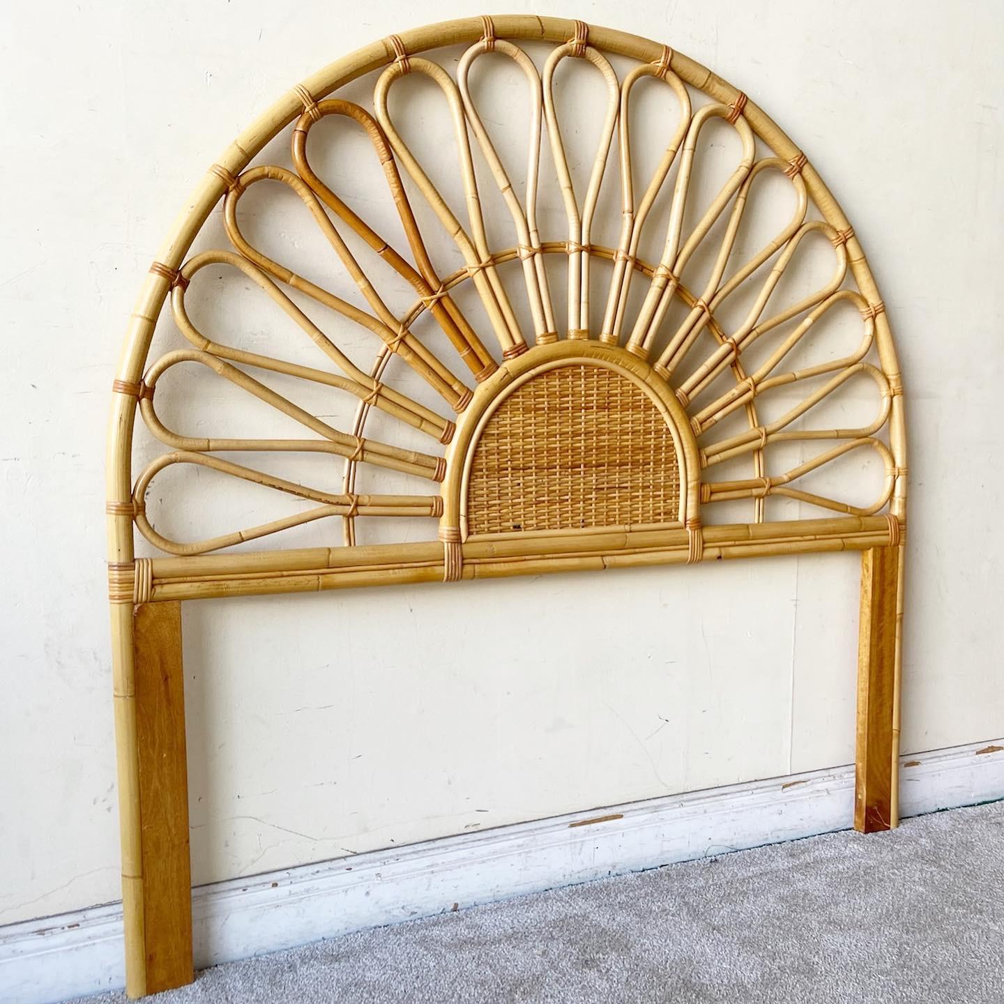 Exceptional vintage bohemian queen size headboard. Features a Naboo arched frame with rattan wicker.
  