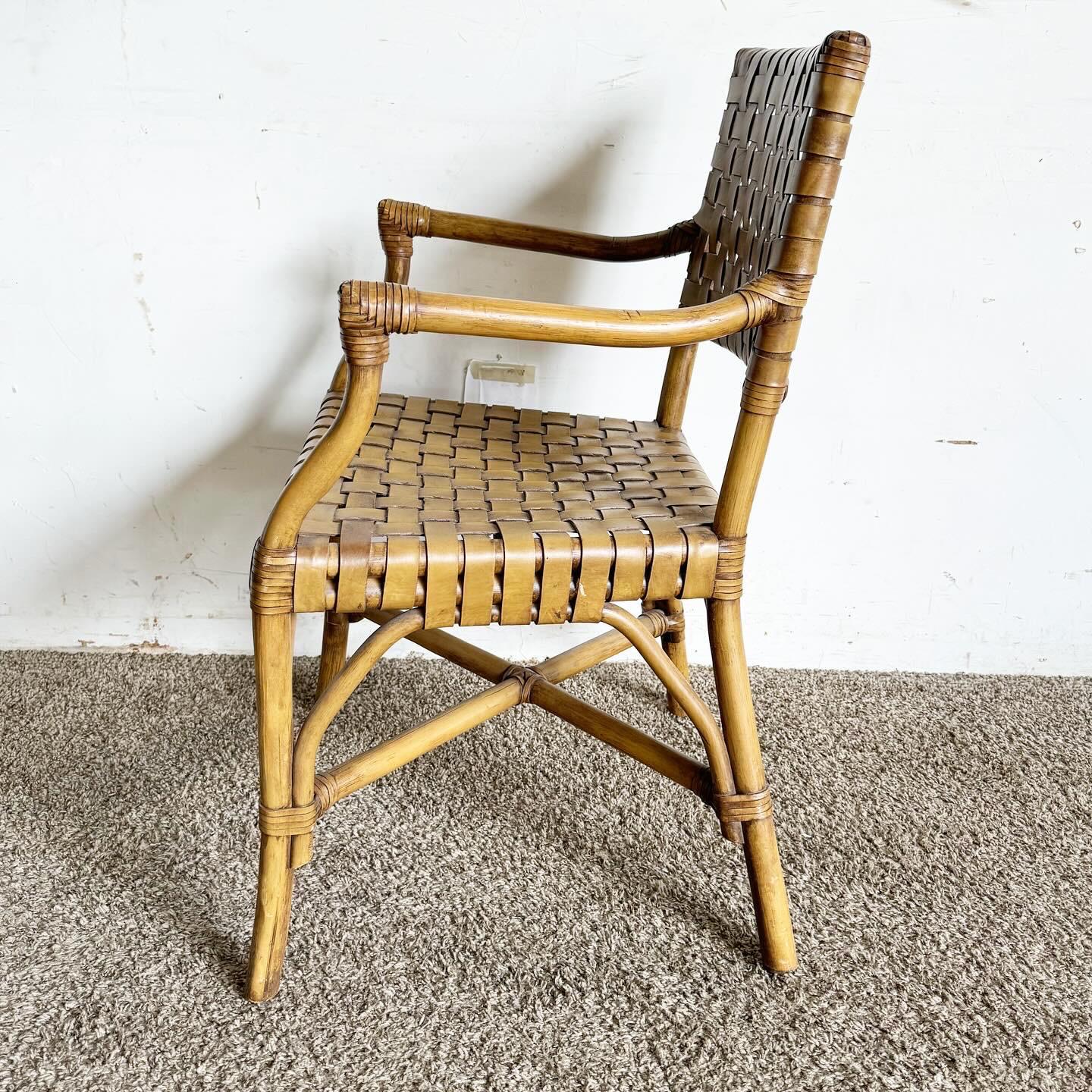 Boho Chic Bamboo Rattan and Woven Leather Arm Dining Chair In Good Condition In Delray Beach, FL