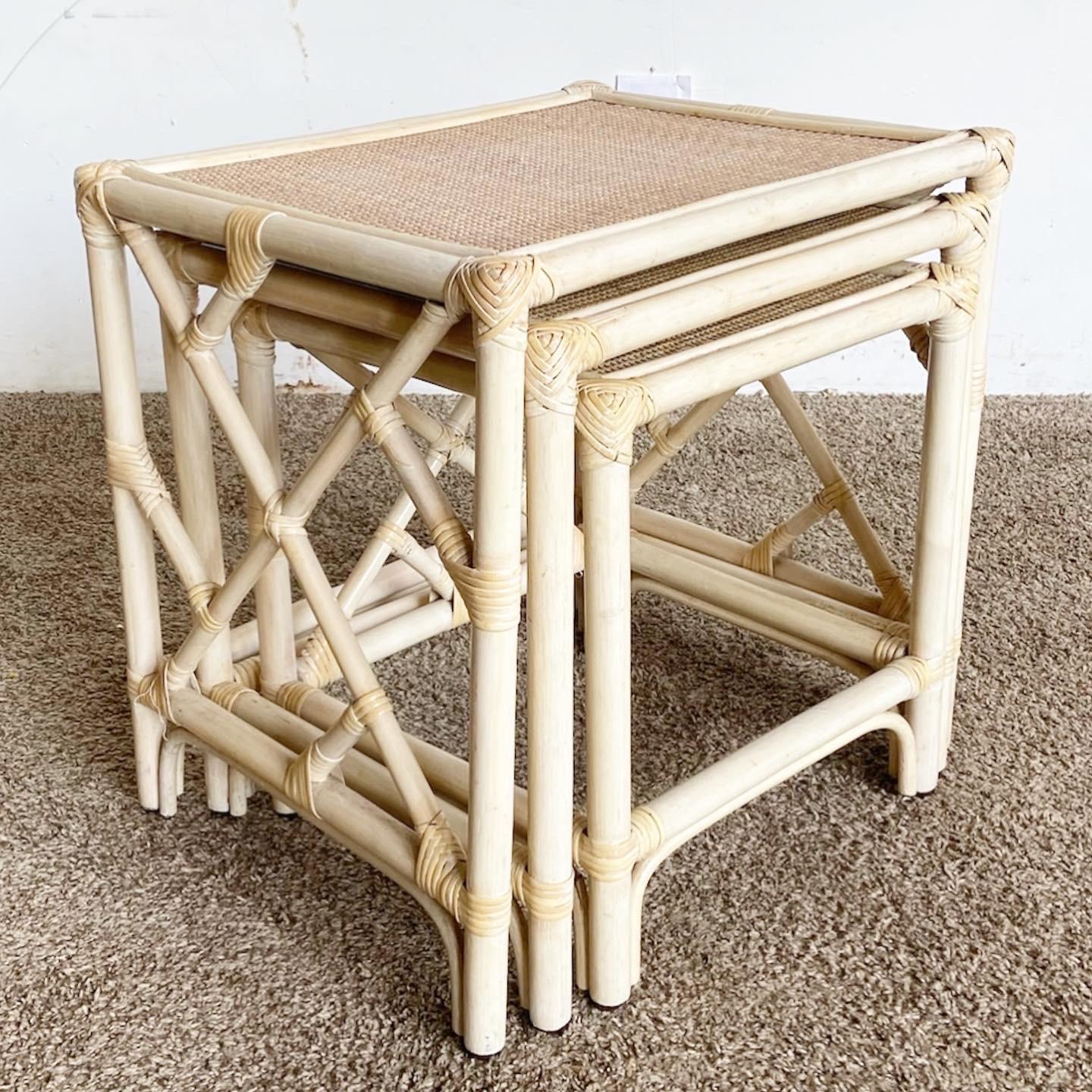 Add eclectic elegance with our Boho Chic Bamboo Rattan Chippendale Style Nesting Tables. A blend of traditional design and bohemian texture.
Minor wear around the edges and legs as seen in the photos.